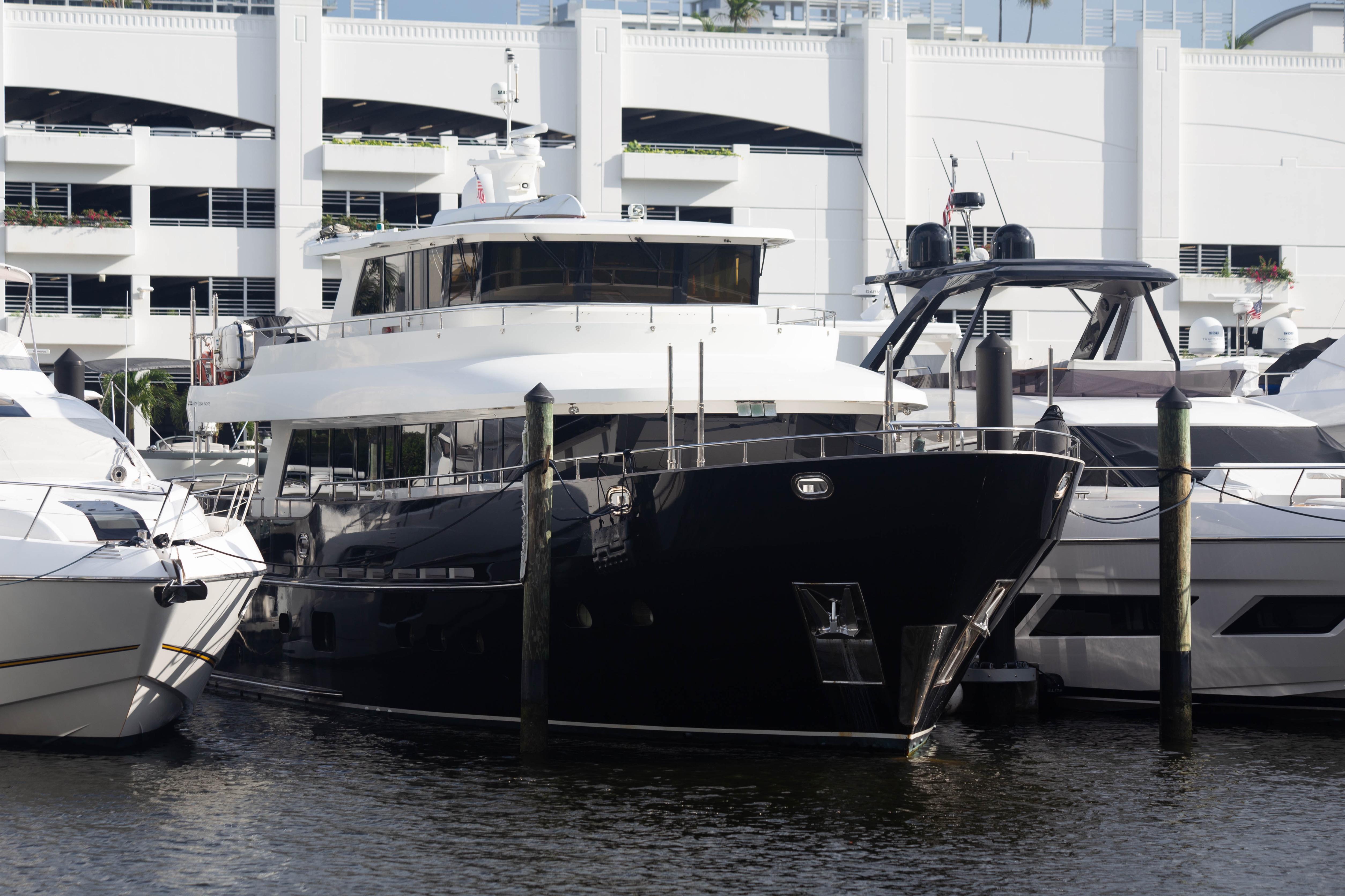 Fifth Ocean Yachts 24m Displacement Explorer Yacht, 2014, docked at marina.
