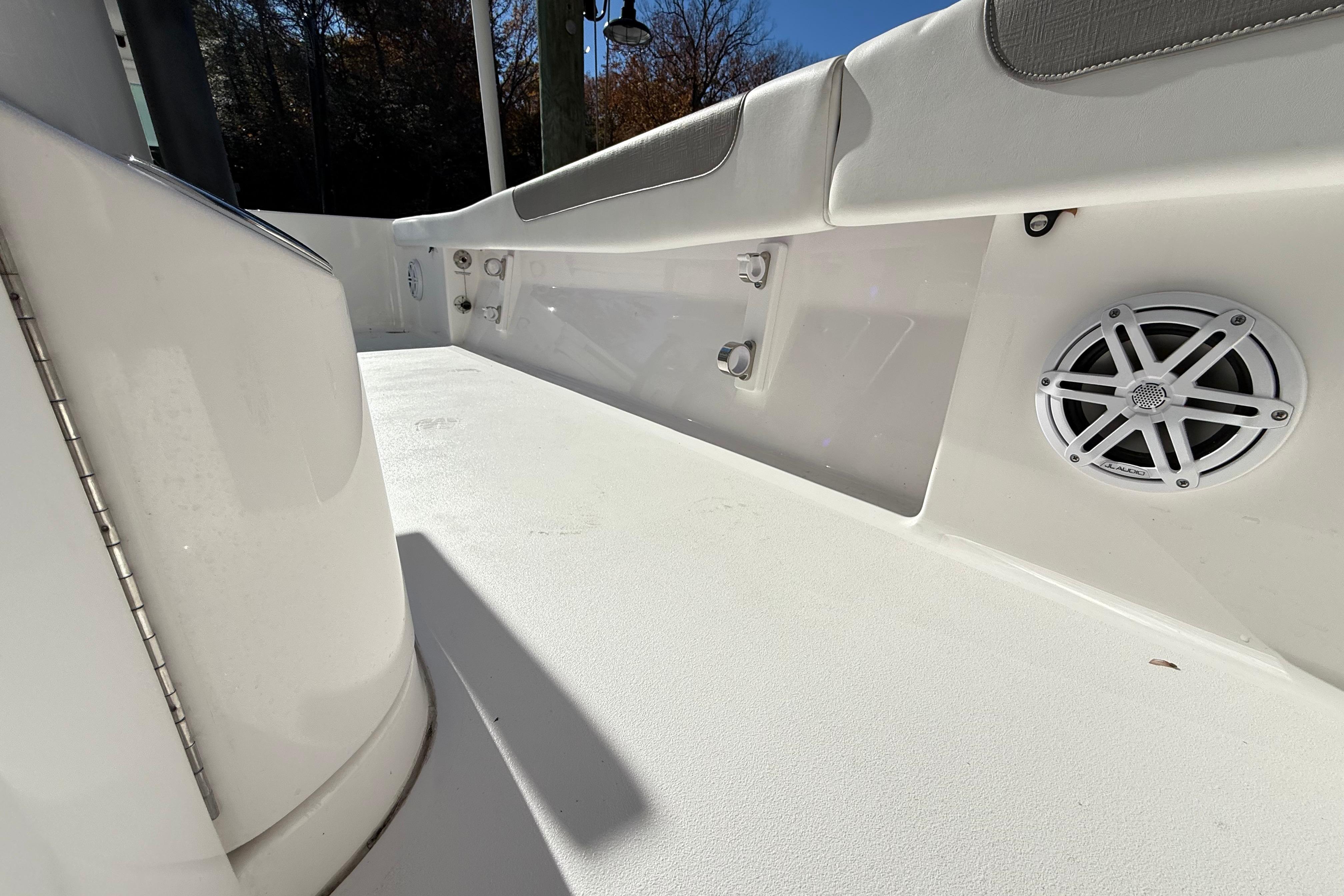 2023 Caymas 281 HB boat interior with speaker and seating detail.