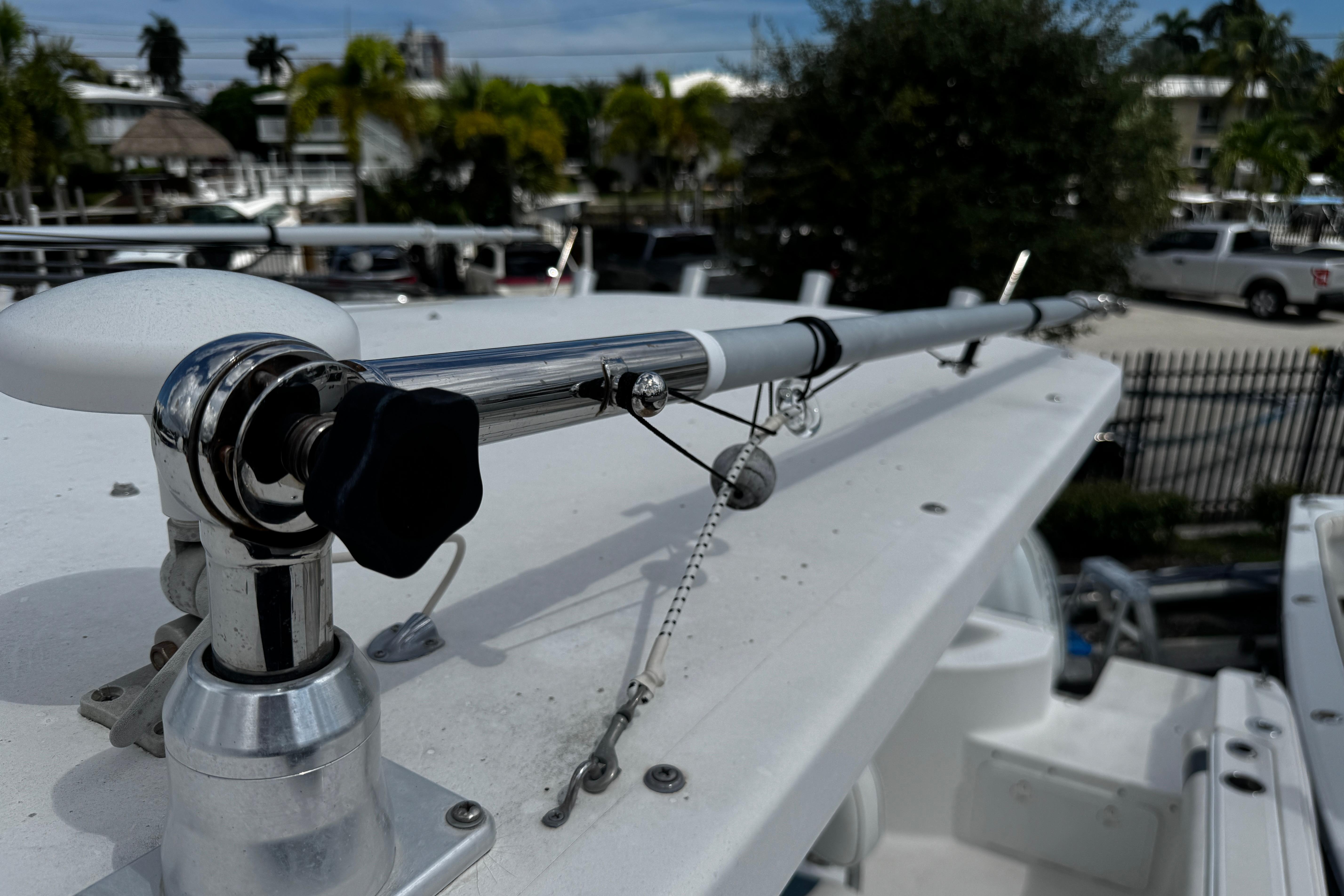 Close-up of a 2008 Sea Fox 287 CC boat's fishing rod holder on deck.