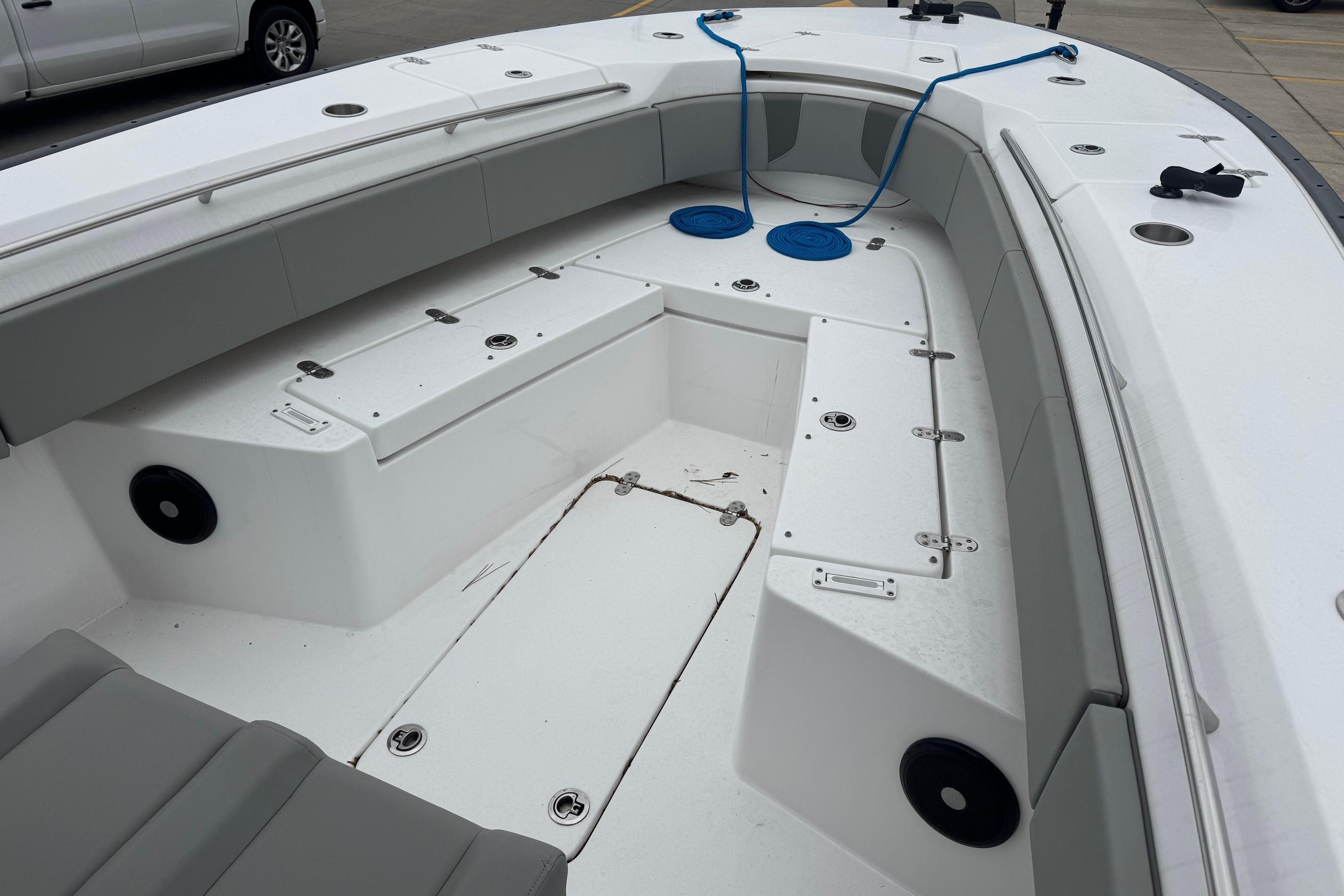 2024 Cape Horn 32 XS boat interior with seating and storage compartments.