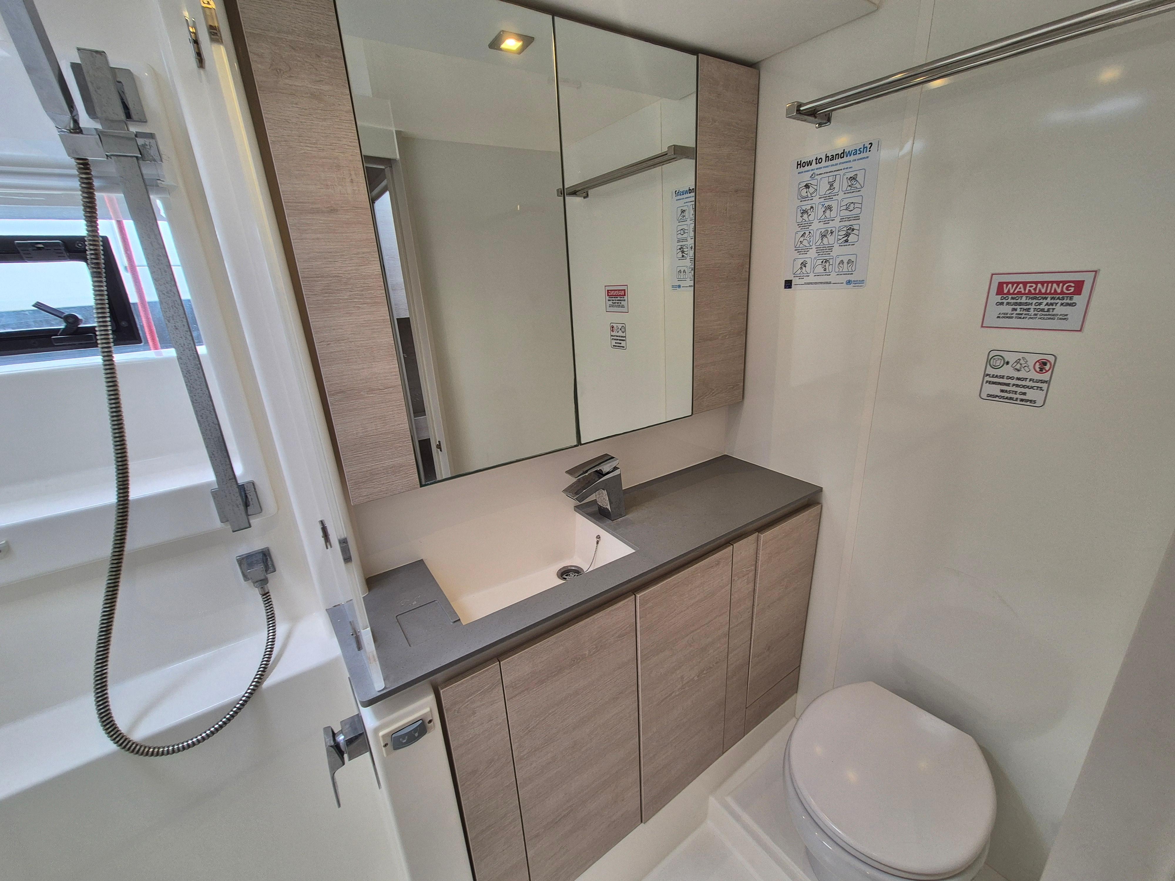 Modern bathroom in a 2021 Leopard 50 yacht.