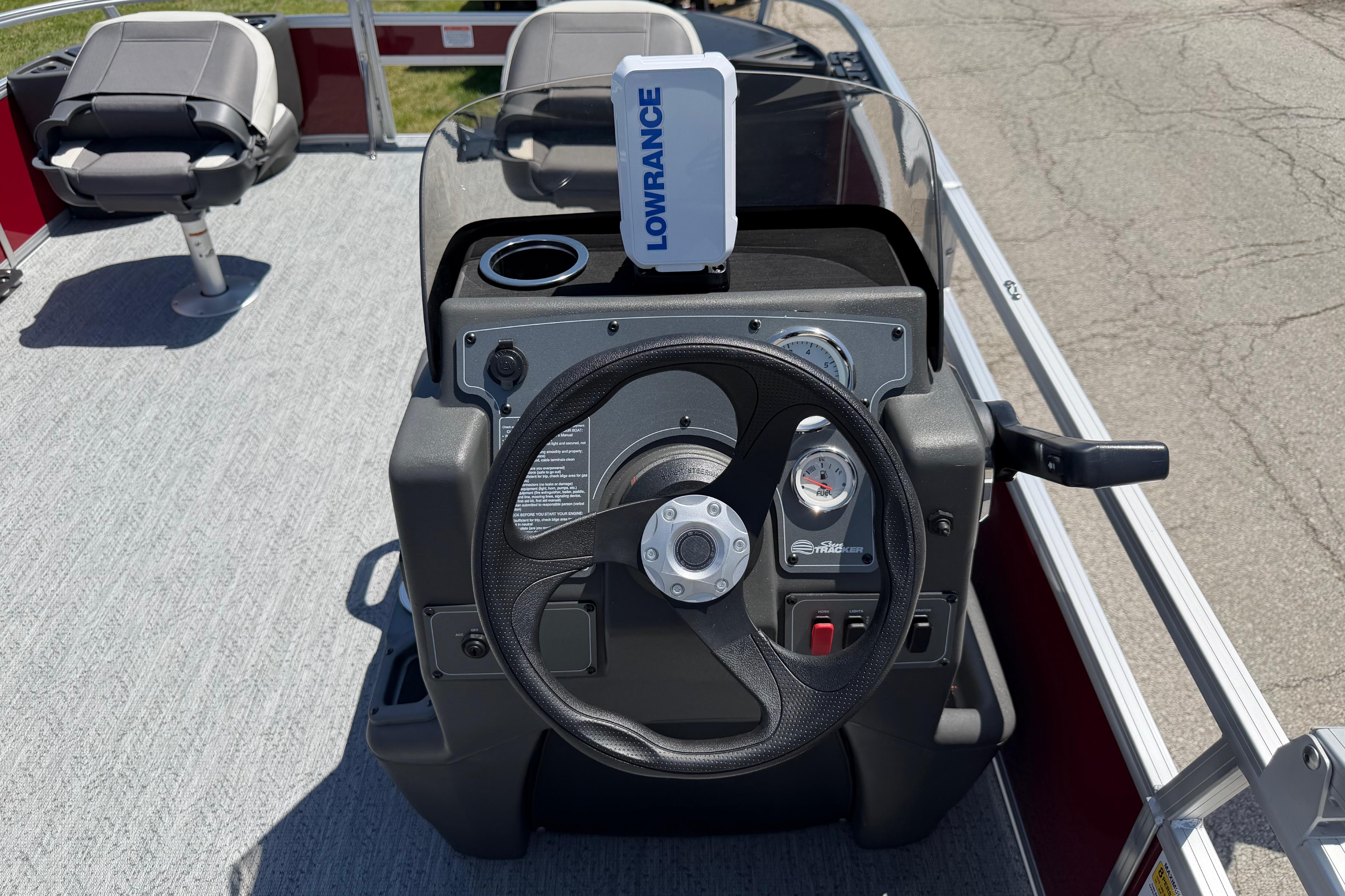 2026 Sun Tracker Bass Buggy 18 DLX steering console with Lowrance device.