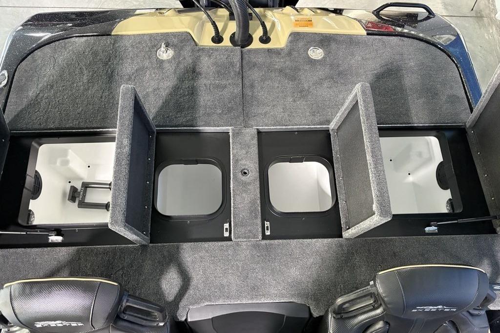 2026 Skeeter ZXE21 boat interior with open storage compartments and seating.