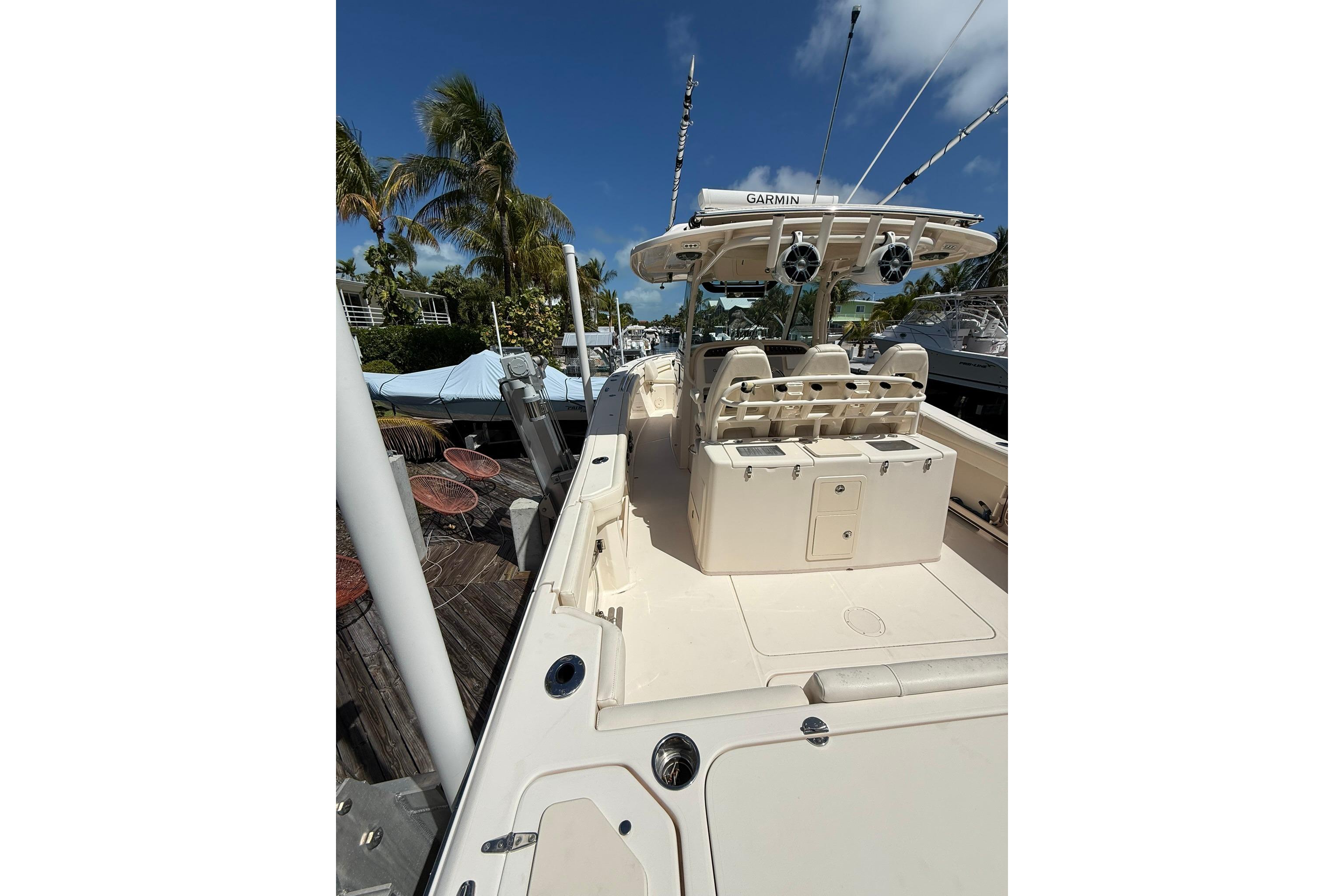 2021 Grady-White Canyon 336 boat docked, featuring spacious deck and modern equipment.