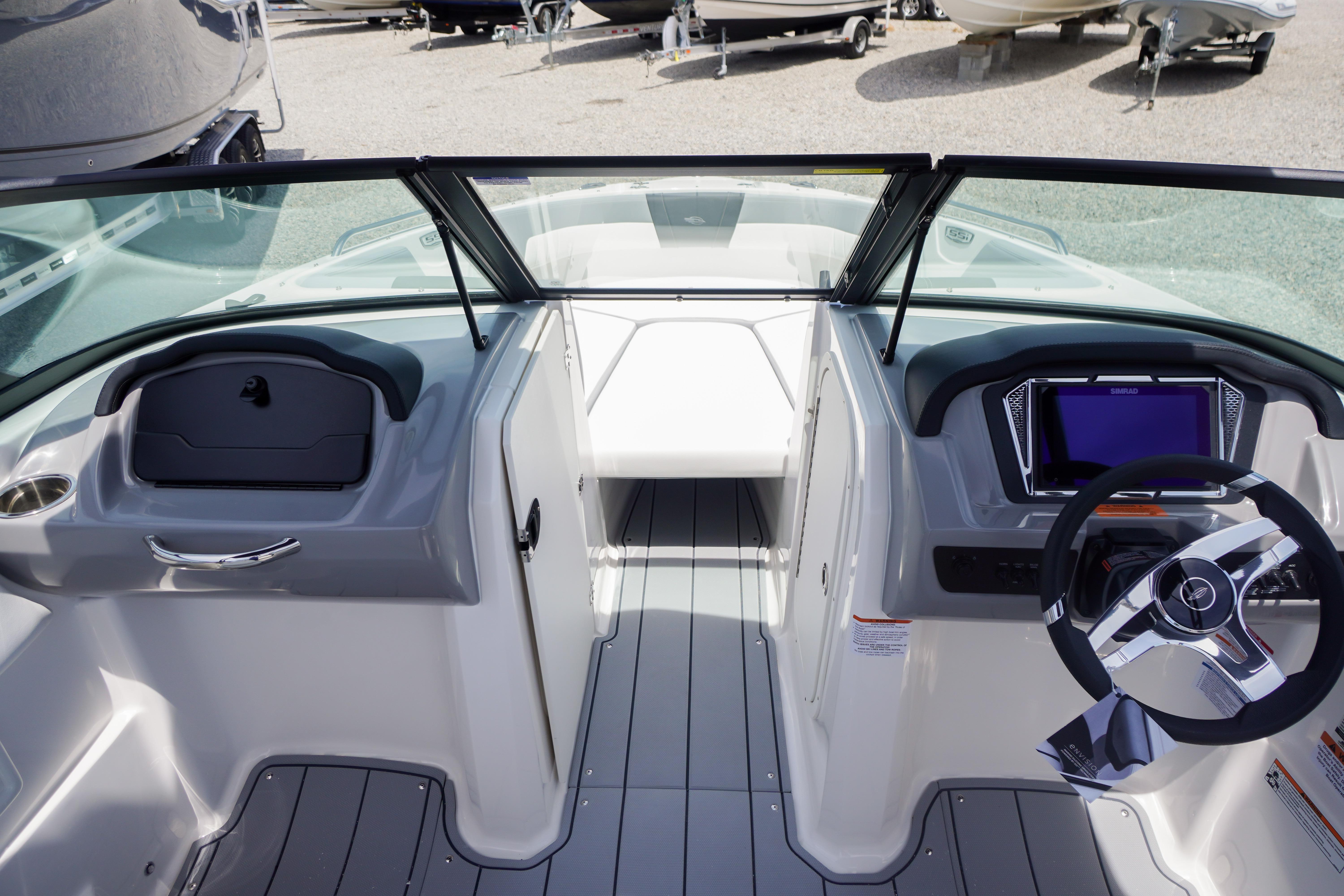 2026 Chaparral 23 SSi OB boat interior with modern dashboard and steering wheel.