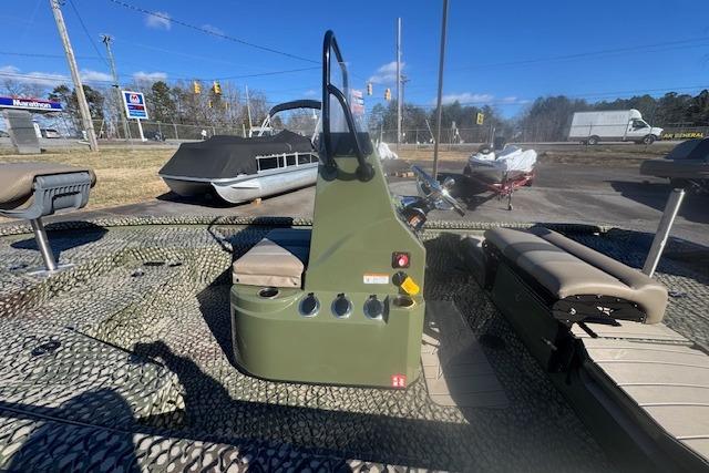 2026 Vexus ACX 2000 boat interior with camouflage design and seating.