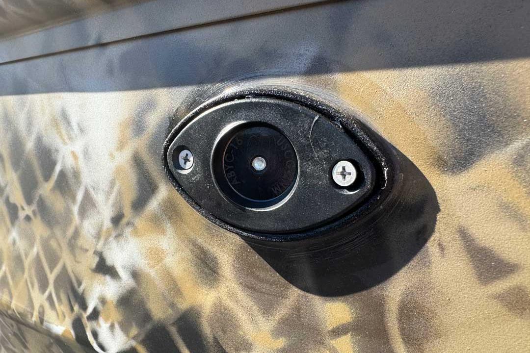 Close-up of 2026 Excel Switchblade's camouflaged exterior detail with screws.