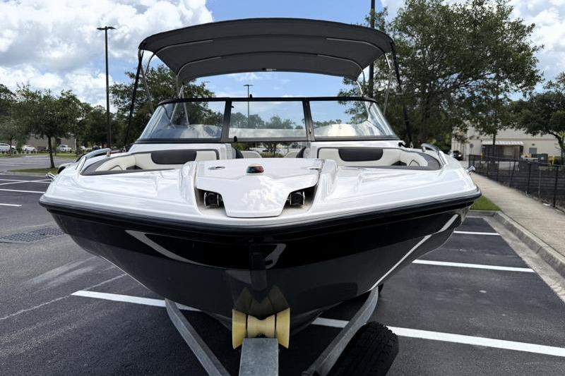 2017 Yamaha Boats SX210 in a parking lot, front view with canopy.
