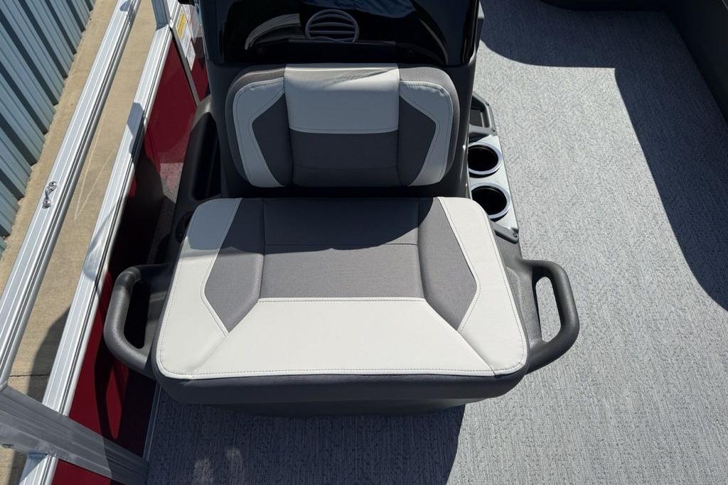 2026 Sun Tracker Bass Buggy 18 DLX boat seat with cup holders and modern design.
