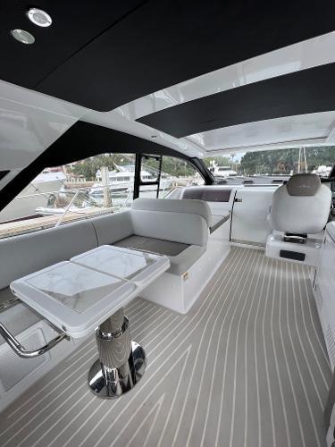 2019 Azimut 51 Atlantis Coupe interior with modern seating and sleek design.