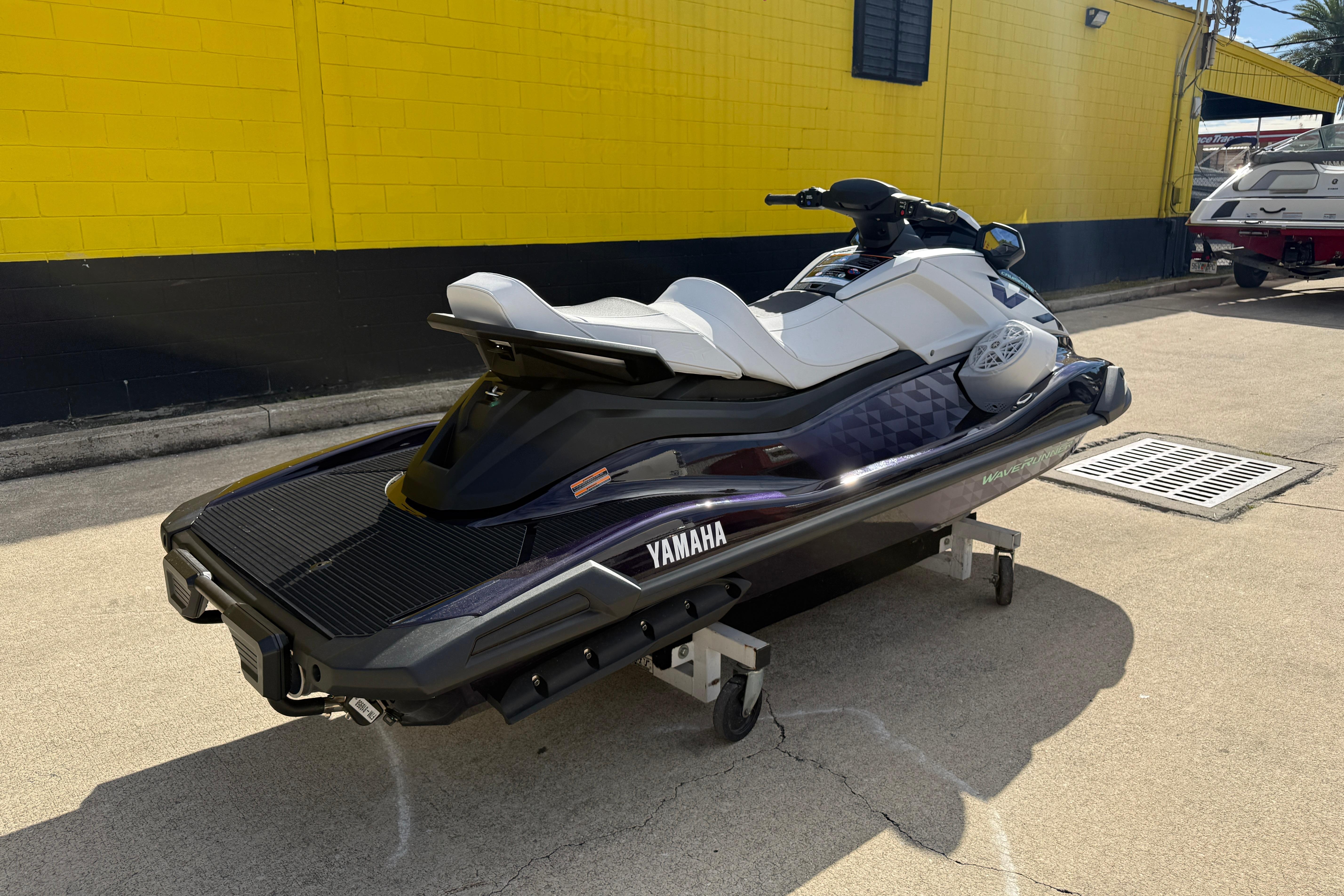 2026 Yamaha WaveRunner VX Cruiser HO parked near a yellow building.
