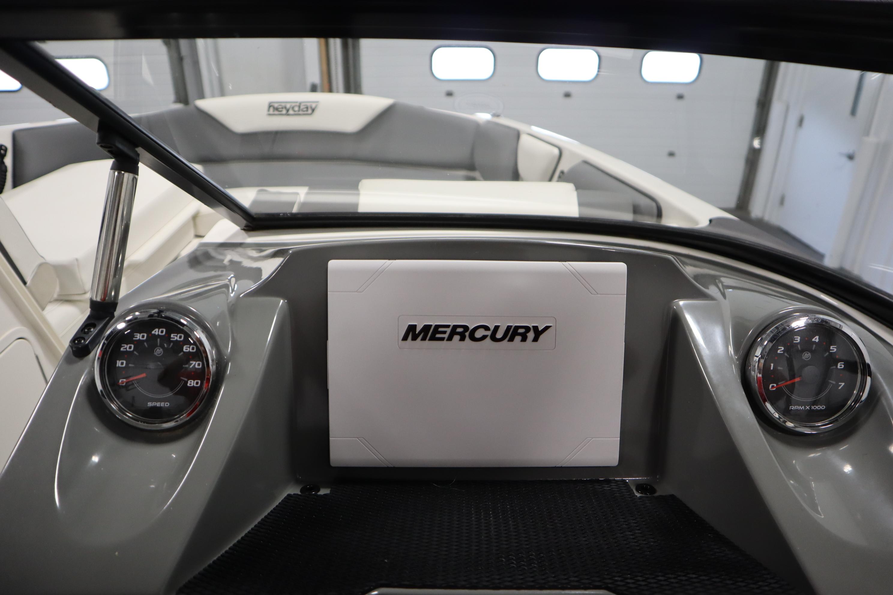 2023 Heyday WT Surf boat dashboard with Mercury controls and gauges.