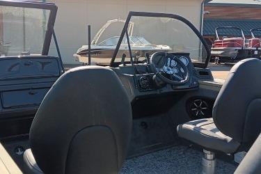 2026 Tracker Targa V-19 Combo boat interior with steering wheel and seating.