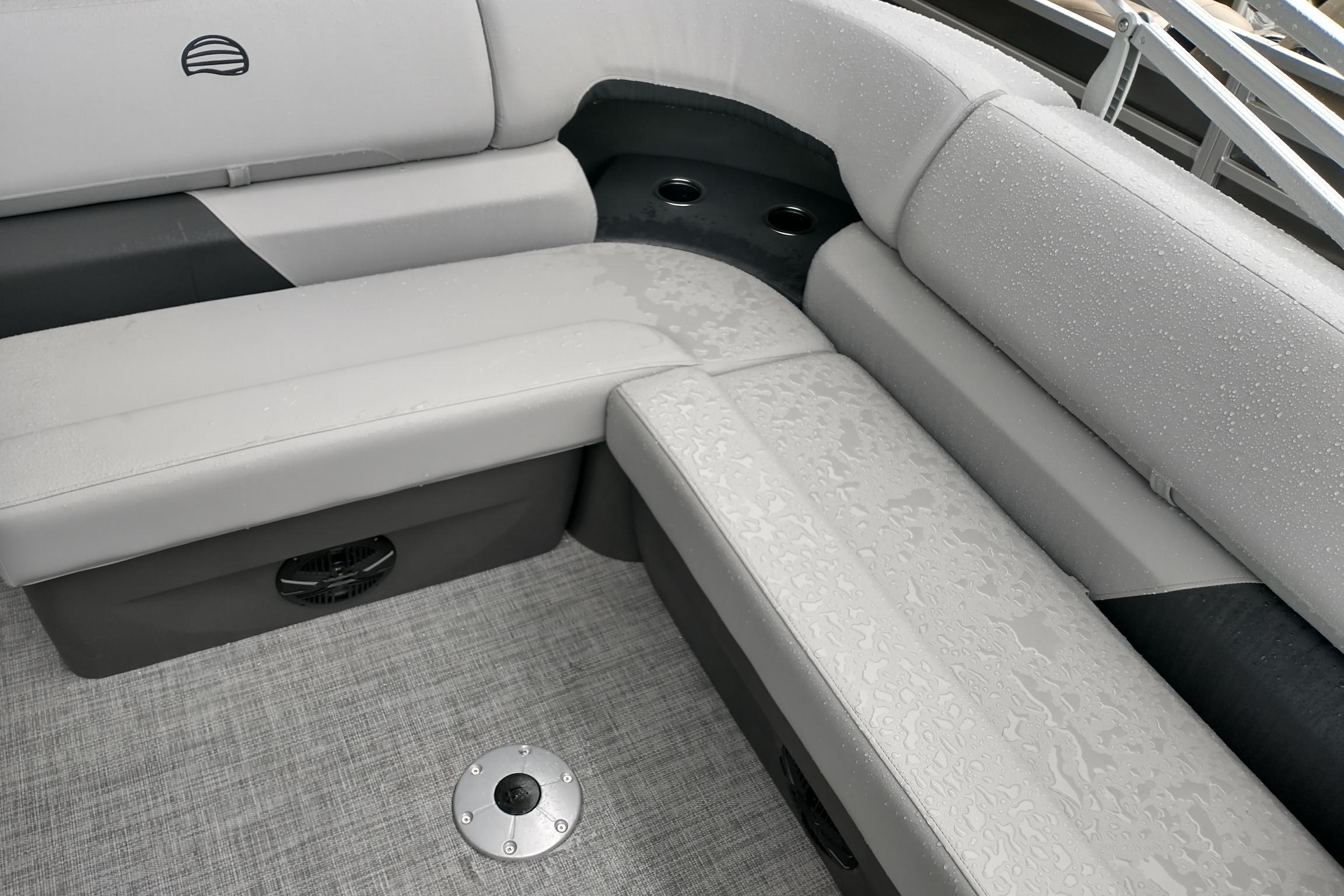 Interior seating of 2026 Sun Tracker Party Barge 20 DLX with wet upholstery.