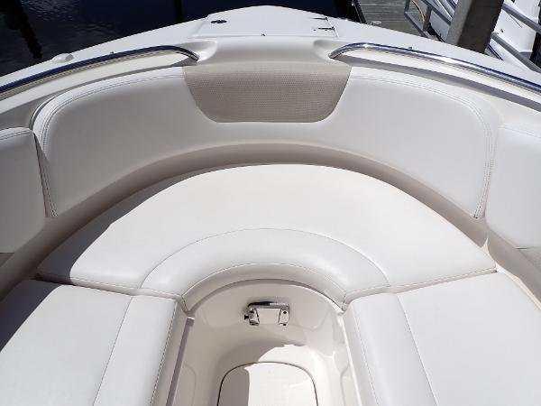 2011 Chaparral 287 SSX boat interior with white cushioned seating.
