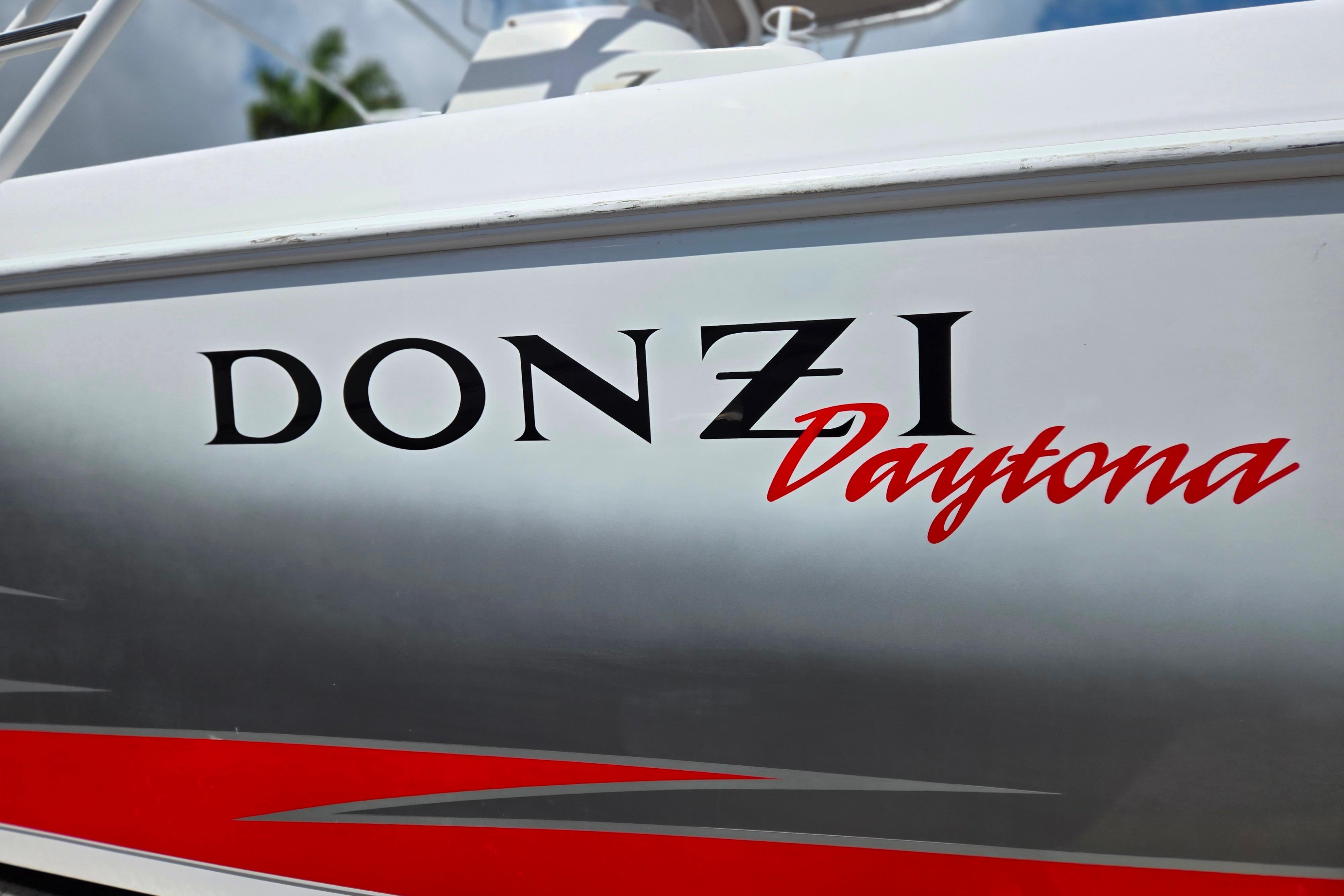 2007 Donzi 35 ZF Daytona boat logo with sleek red and black design.