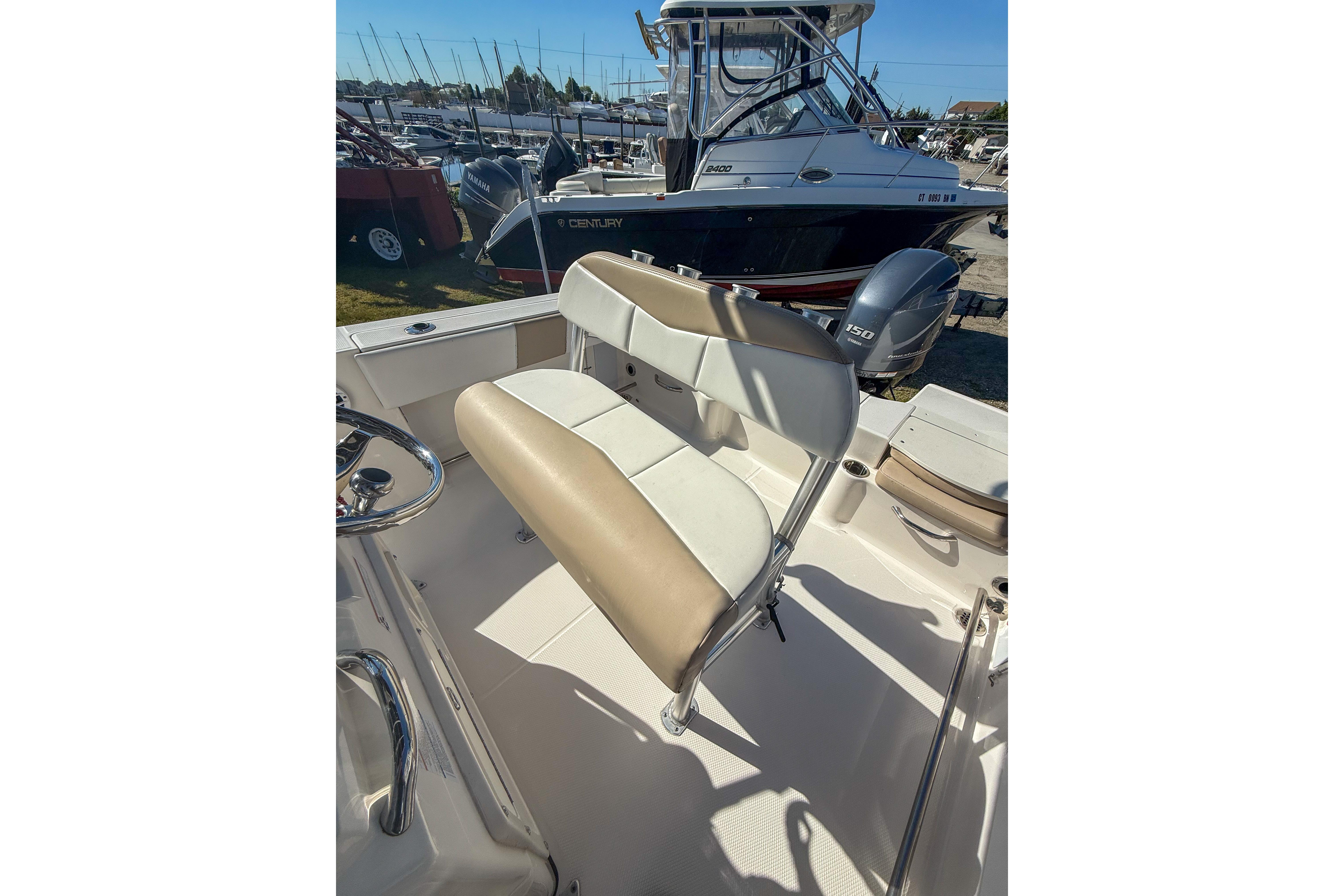 2021 Robalo R200 Center Console boat interior with seating and steering wheel.