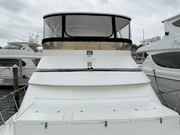 Novatec Islander 55 yacht, 2000 model, docked at marina with overcast sky.
