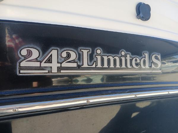 Yamaha Boats 2010 242 Limited S logo on boat exterior.