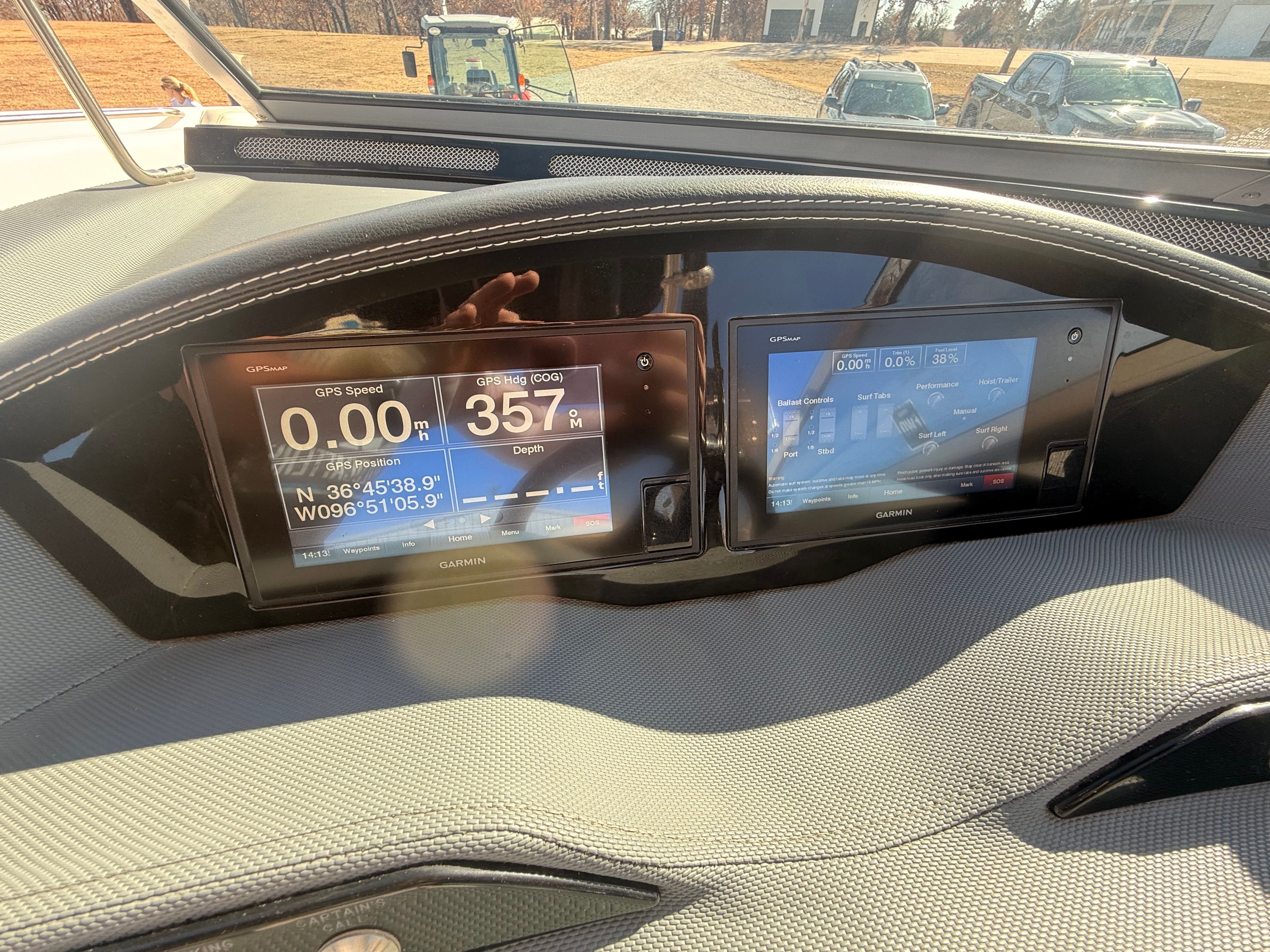 The image shows the dashboard of a 2019 Cobalt R7 Surf boat with two digital displays.