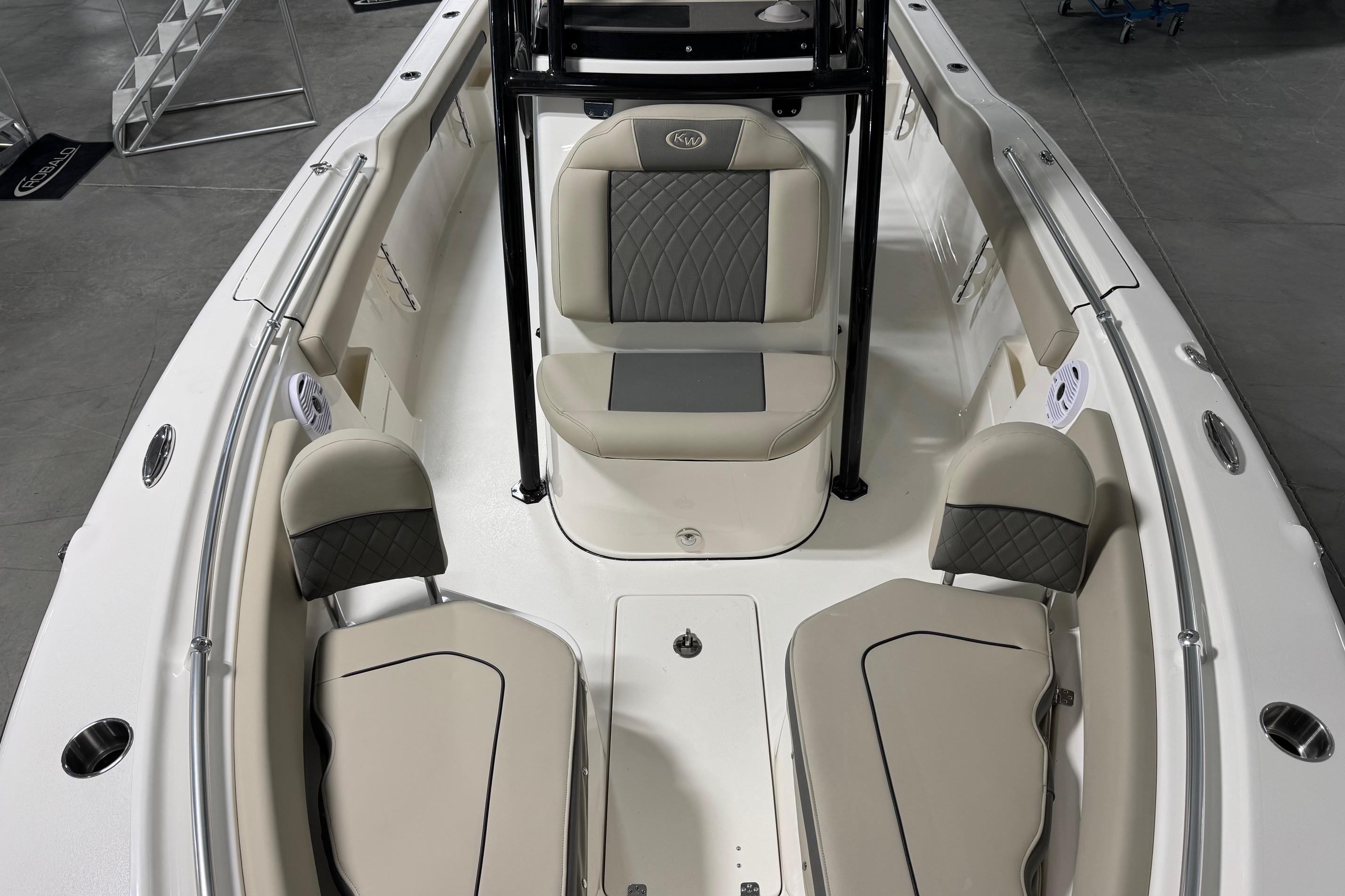 2026 Key West 239 FS boat interior with beige seating and modern design.