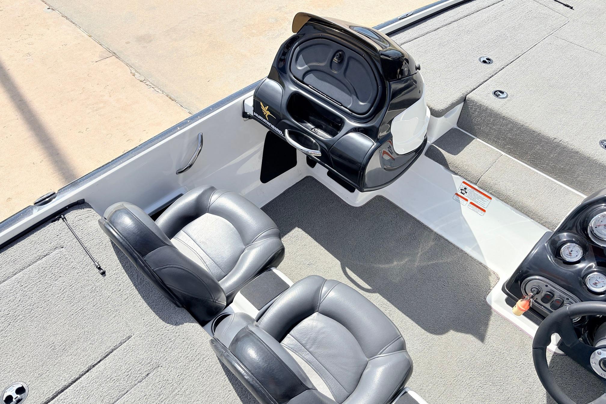 Interior of a 2011 Nitro Z-7 boat featuring dual seats and control panel.