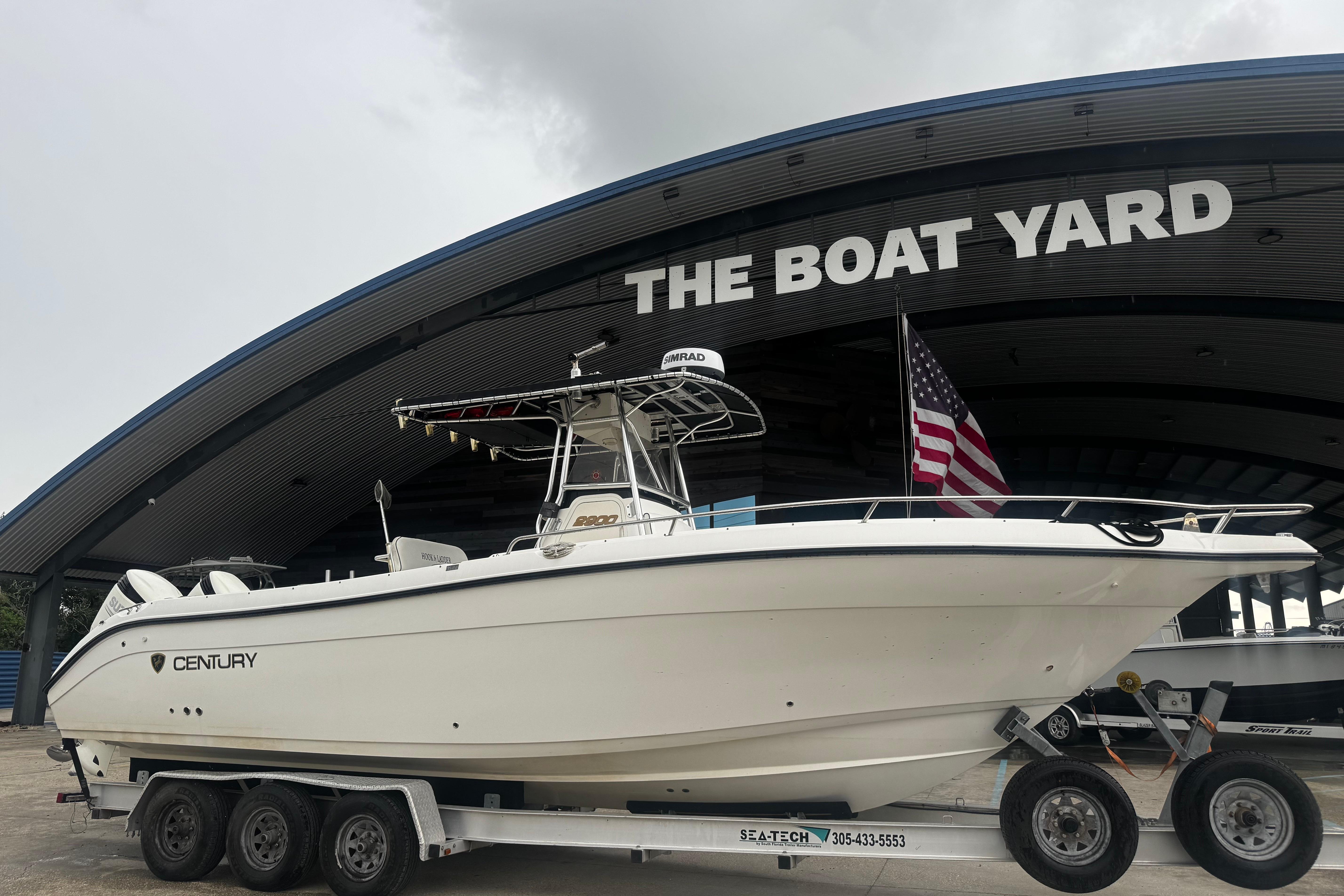 2004 Century 2900 Center Console boat on trailer at The Boat Yard.