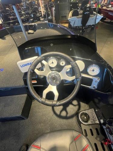 2025 Nitro ZV19 boat dashboard with steering wheel and gauges.