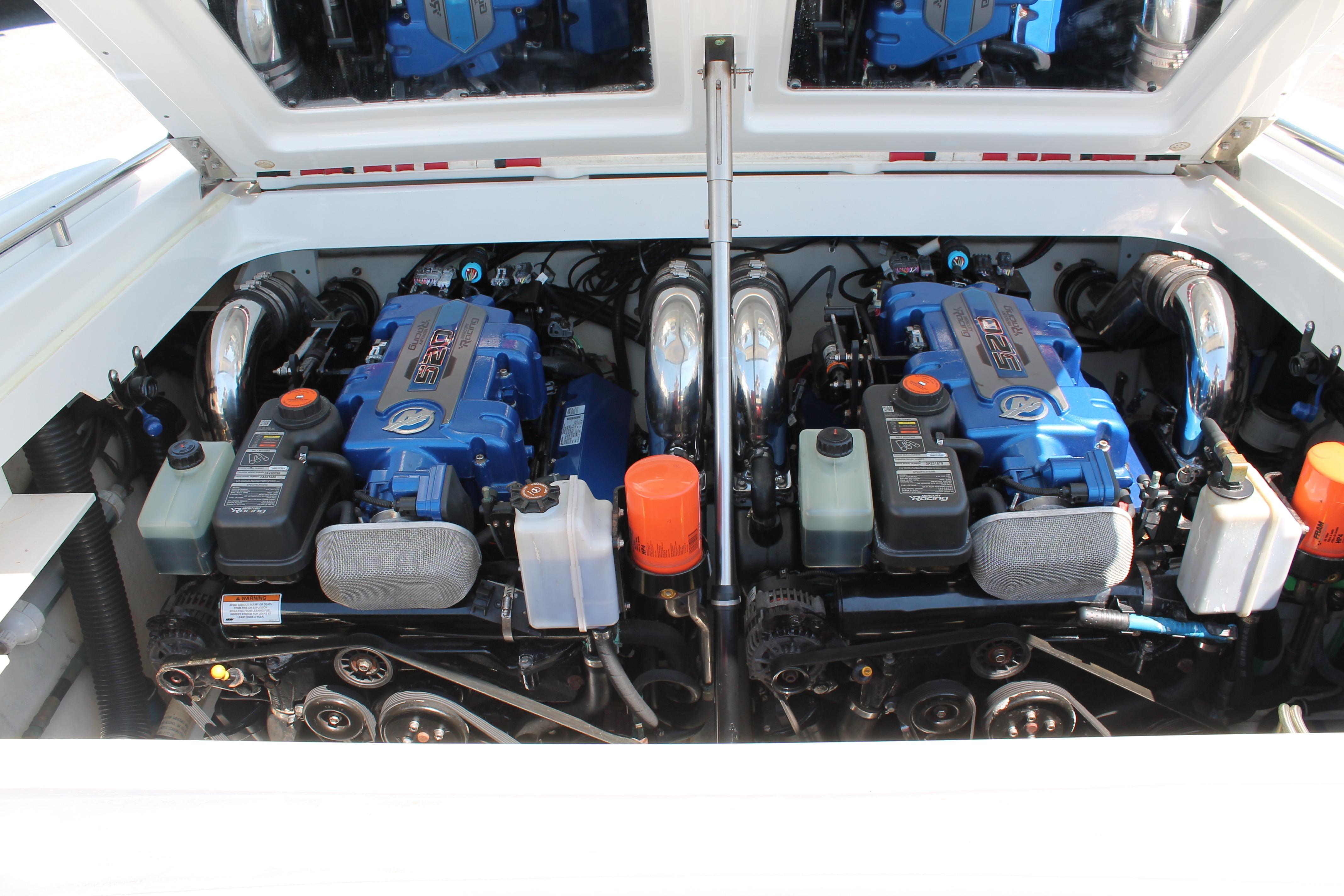 Twin engines in a 2016 Formula 353 FASTech boat, showcasing powerful performance.