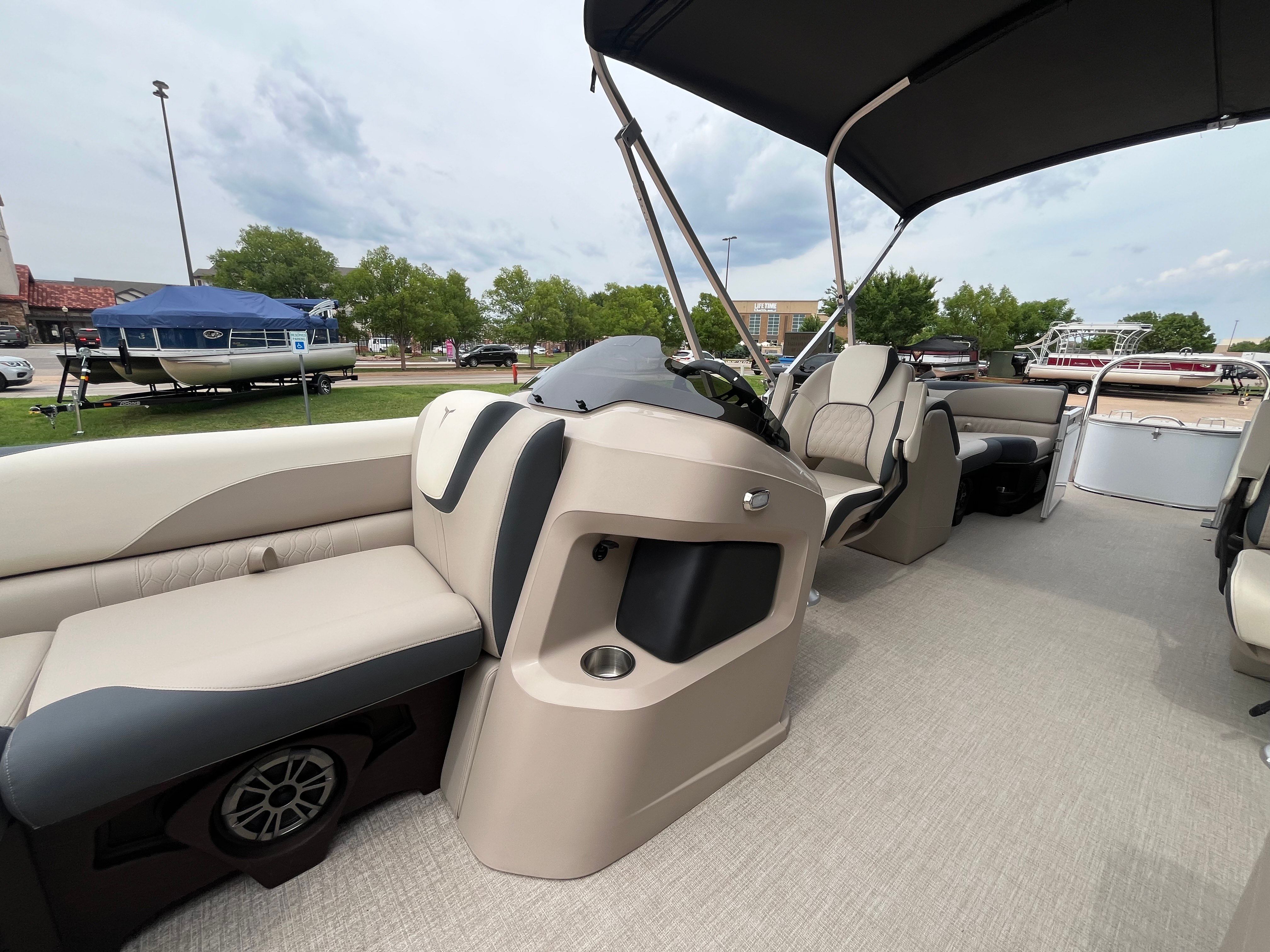 Interior of 2025 Tahoe LTZ QL pontoon boat with luxurious seating.