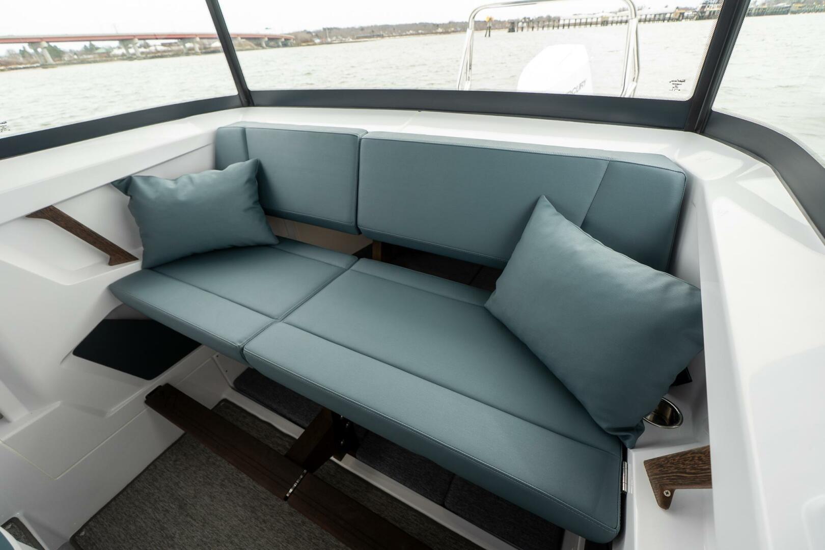 Luxurious seating in the 2026 Axopar 29 XC Cross Cabin boat interior.
