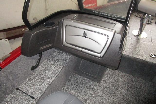 2024 Tracker Pro Guide V-16 WT boat interior with glove compartment and seating.