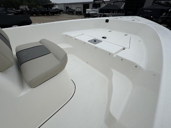 2025 Key West 179 FS boat interior with seating and storage compartments.