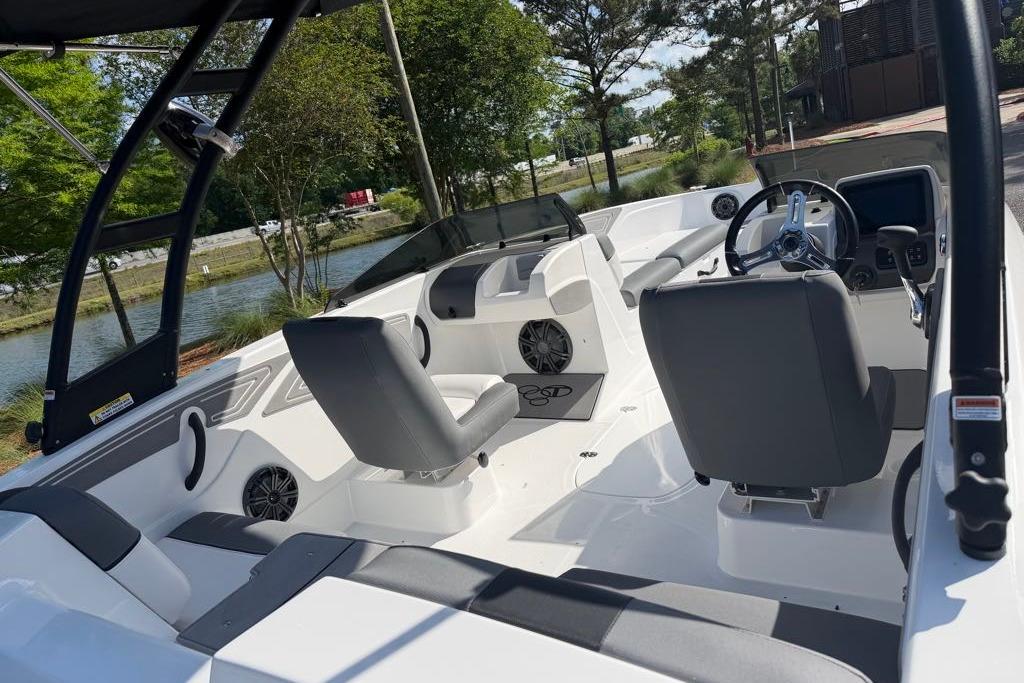 Interior of 2026 Tahoe T21 boat with sleek seating and modern controls.