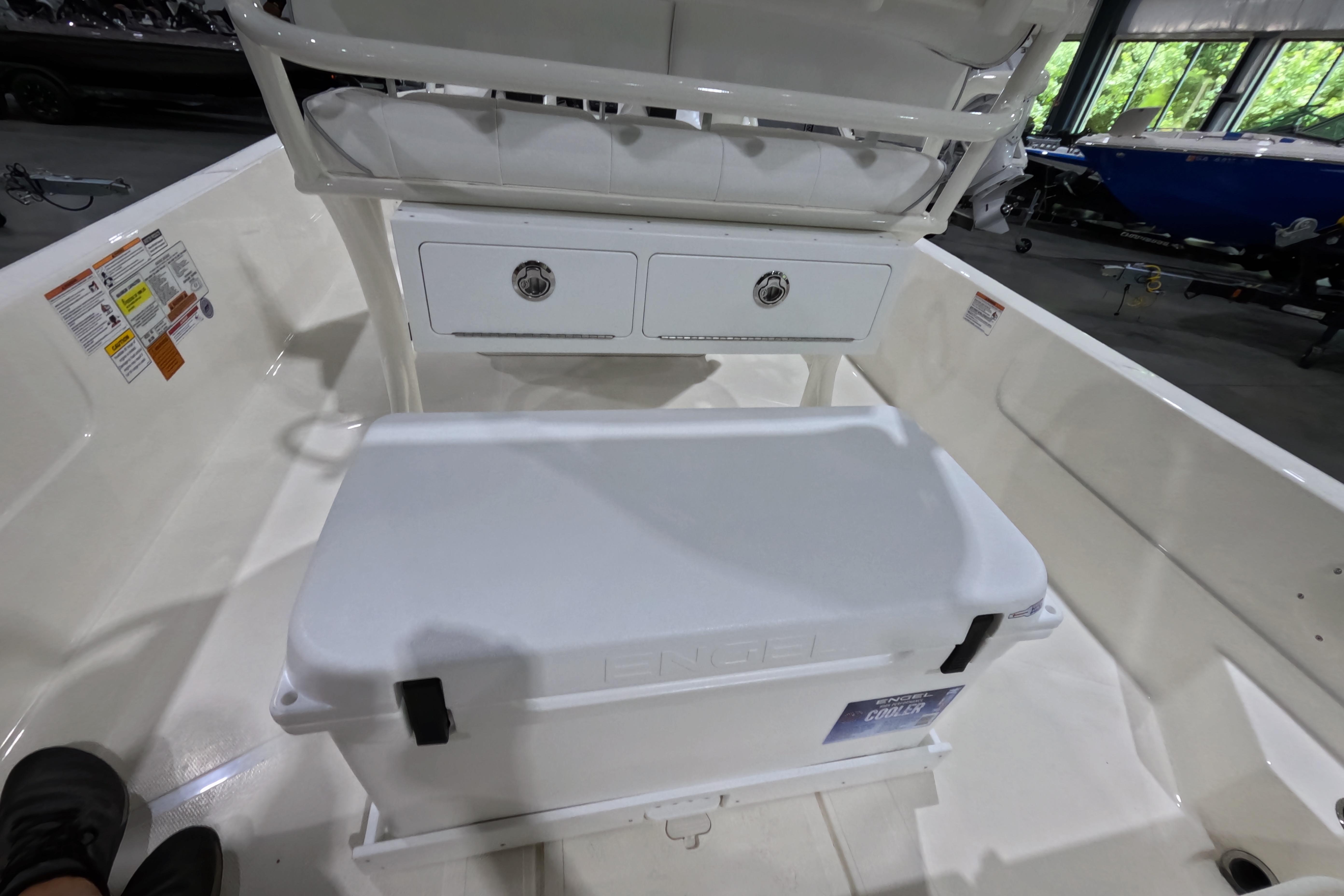 2026 Skeeter SX230 boat interior with Engel cooler and storage compartments.