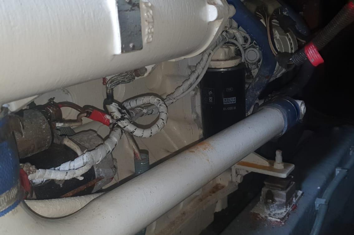 Engine compartment of a 1989 Princess 35 boat, showing wiring and components.