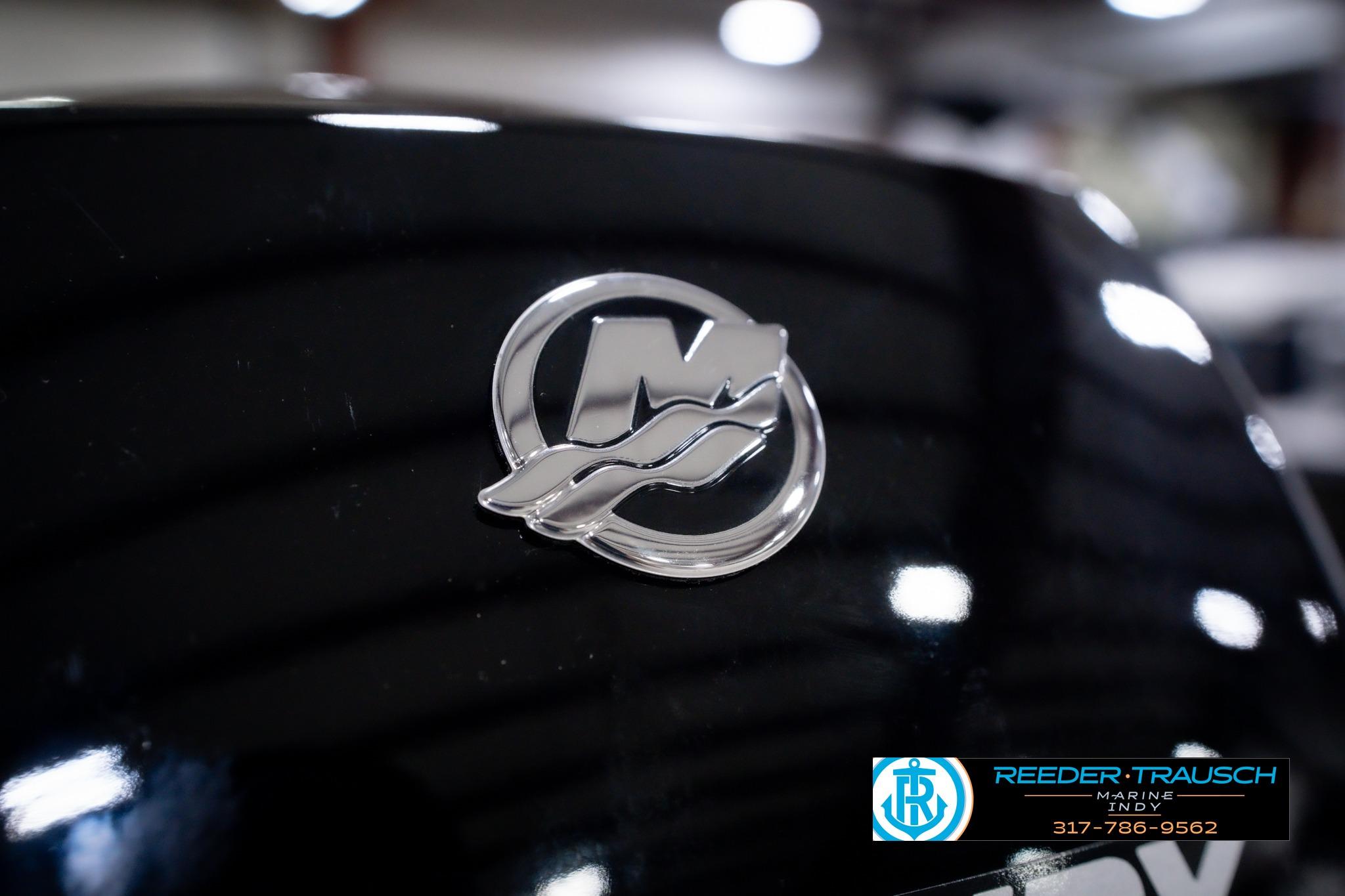 2026 Lund 1600 Fury SS boat with a sleek black exterior and logo detail.