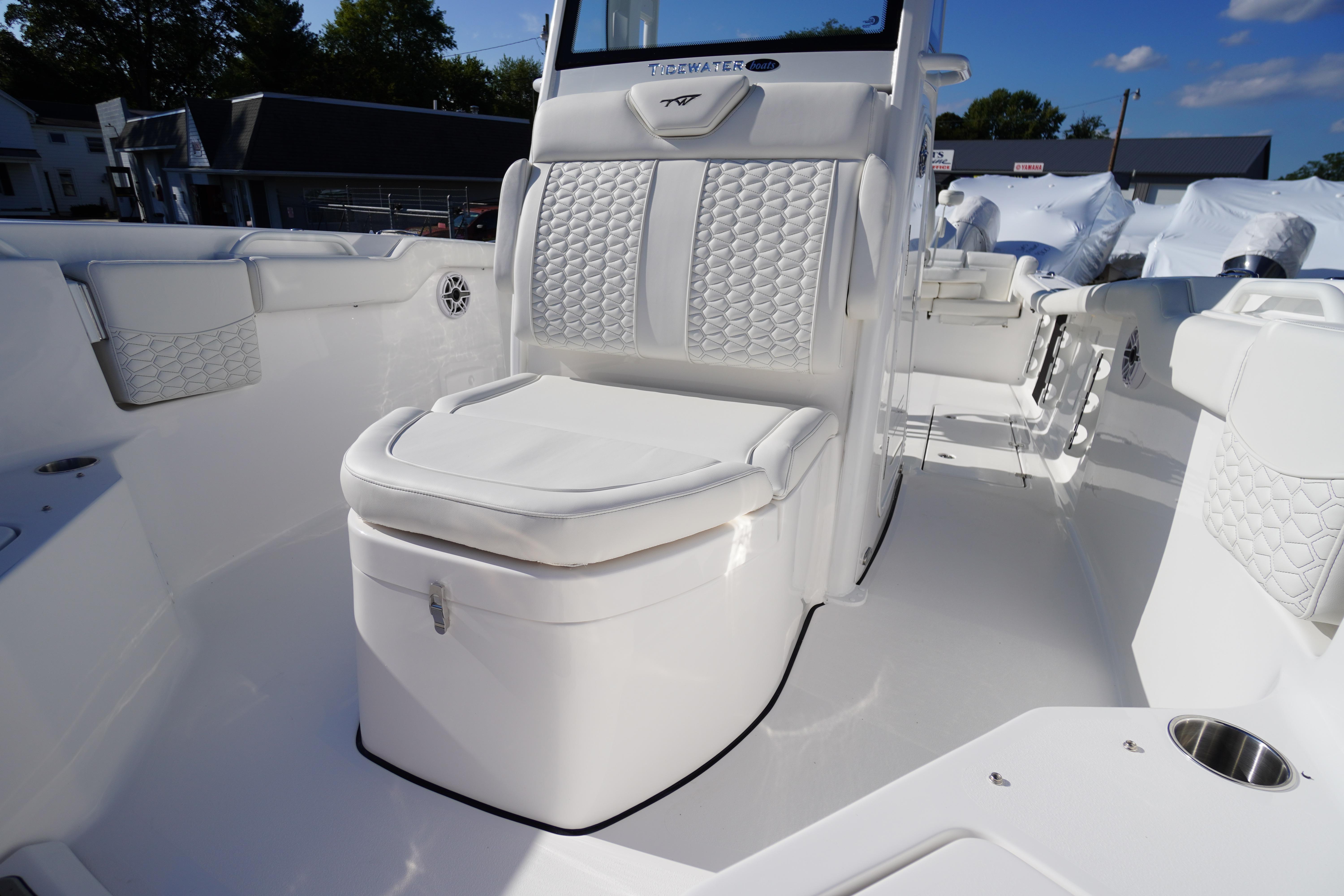 2026 Tidewater 272 LXF boat interior with luxurious white seating and modern design.