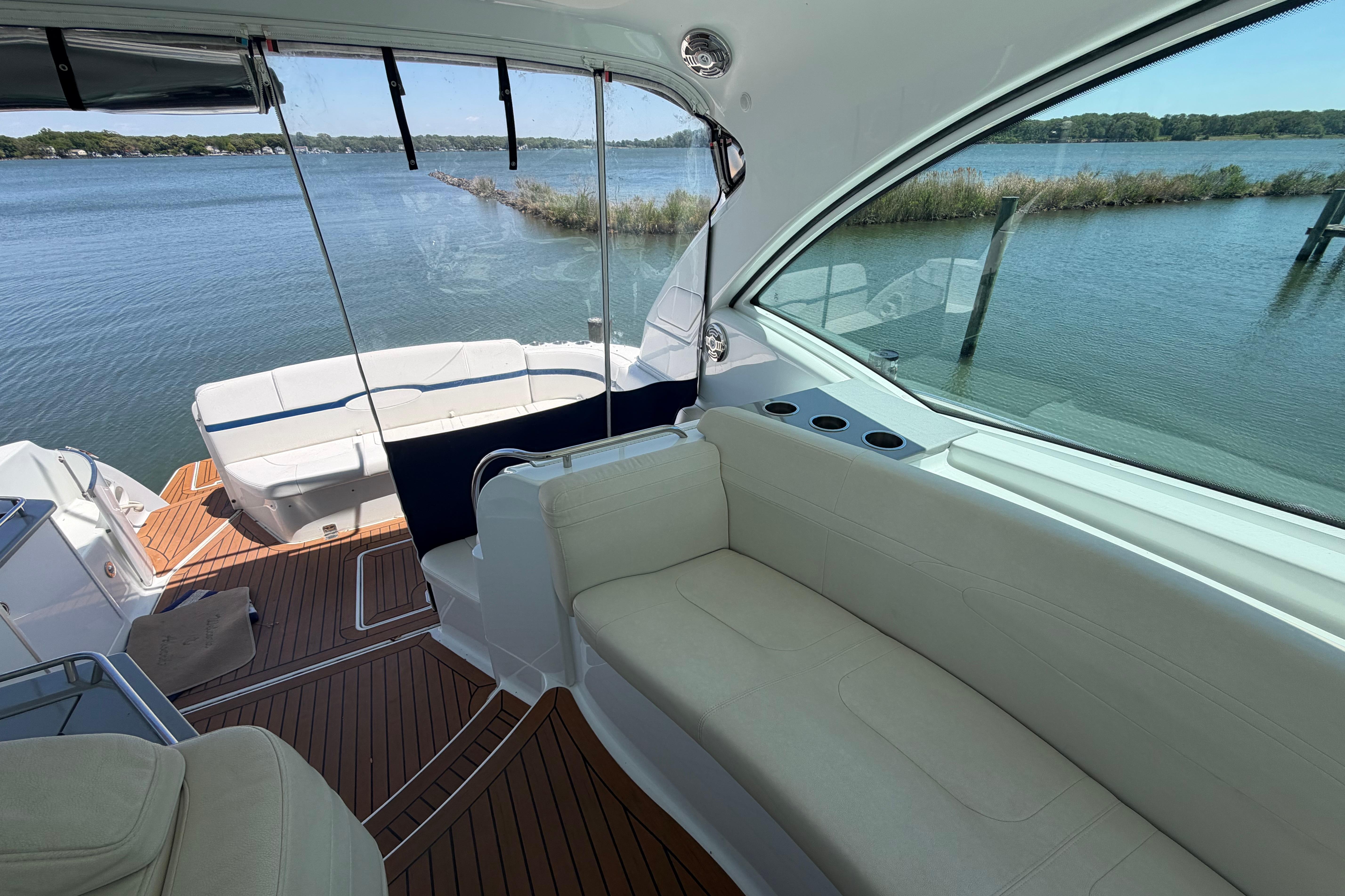 Luxurious interior of a 2011 Formula 45 Yacht with scenic water view.
