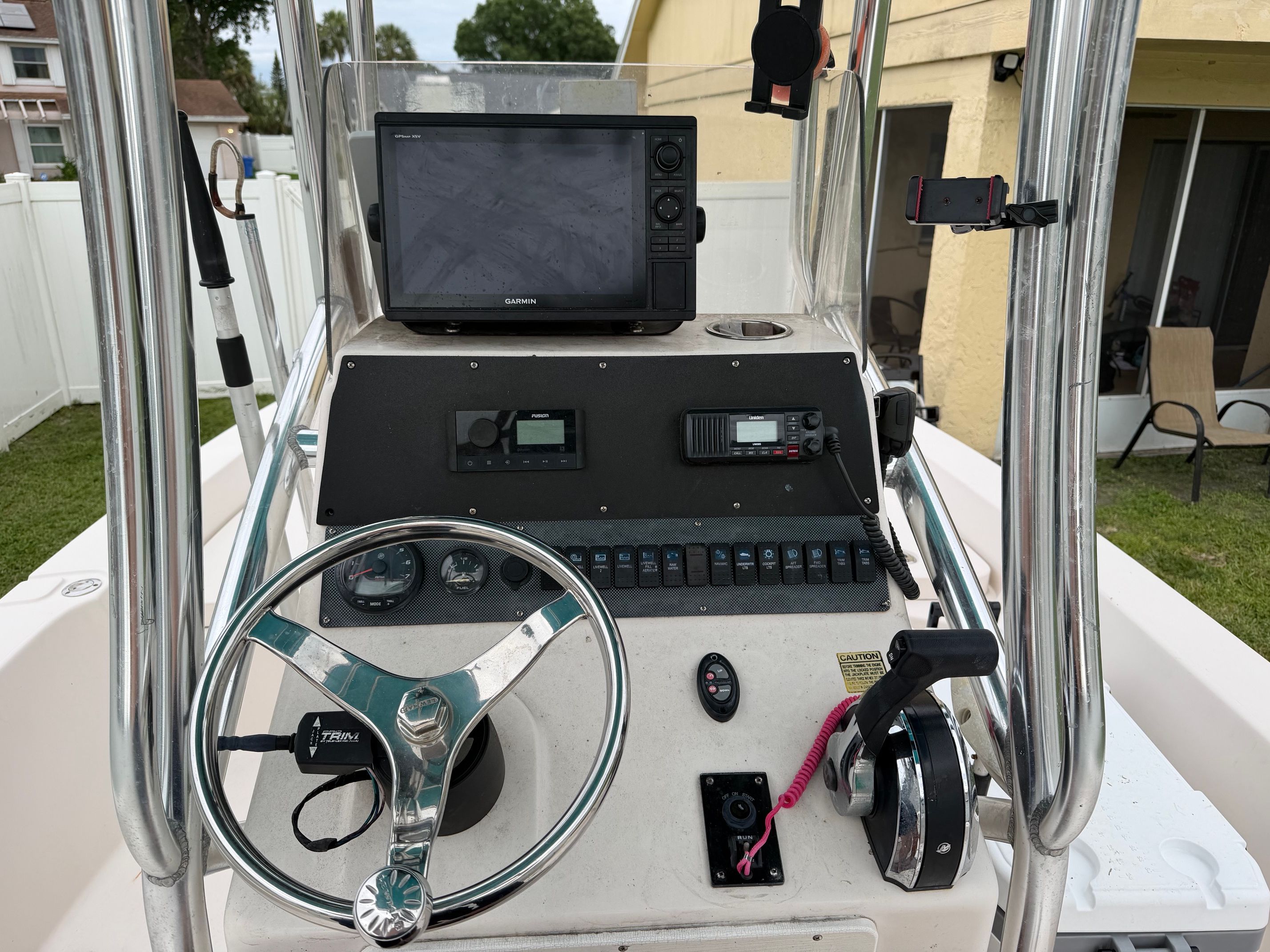 The image shows the helm of a 2006 Pathfinder 2200 Tournament Edition boat with various instruments.