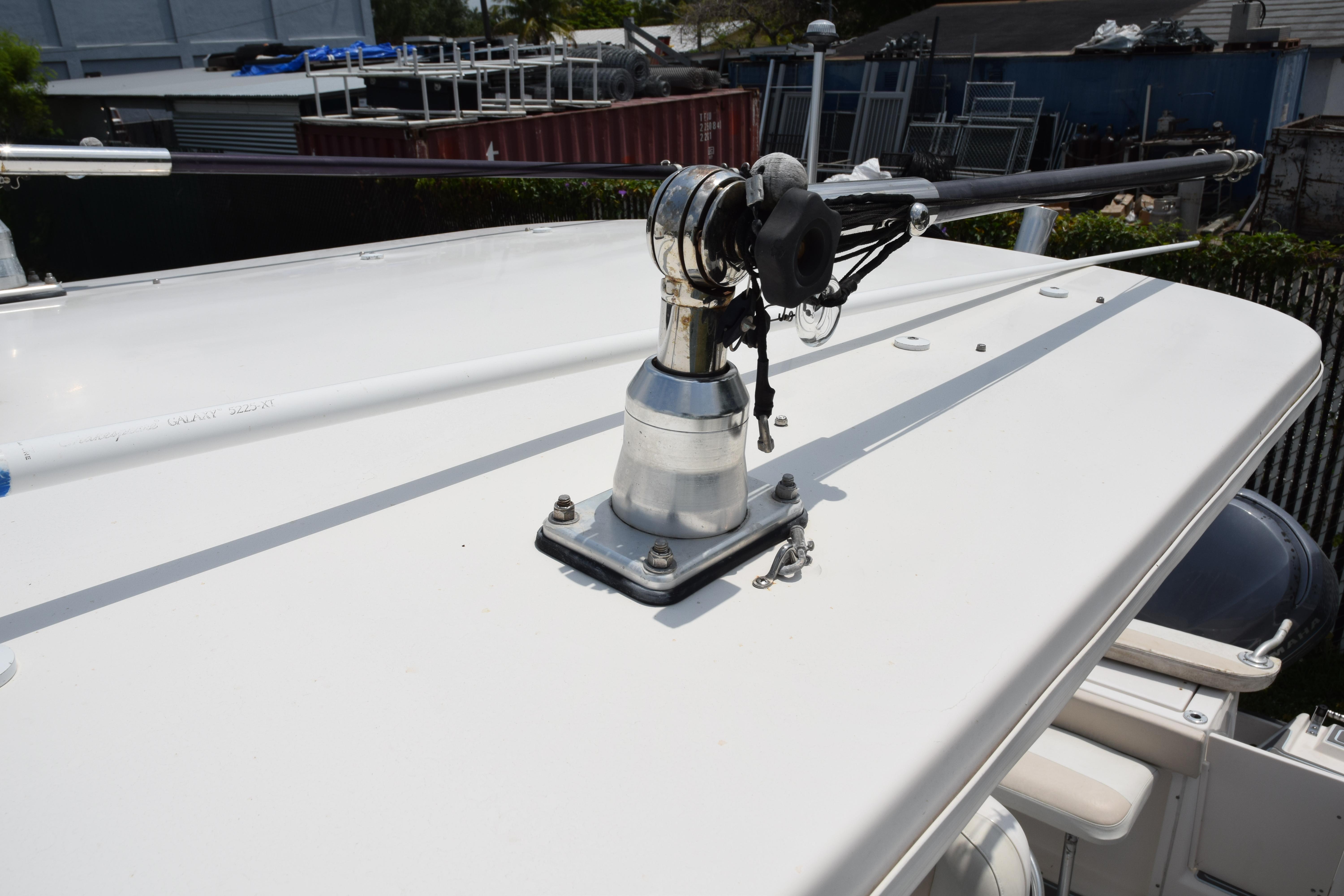 2006 Robalo R260 Center Console boat with mounted equipment on deck.