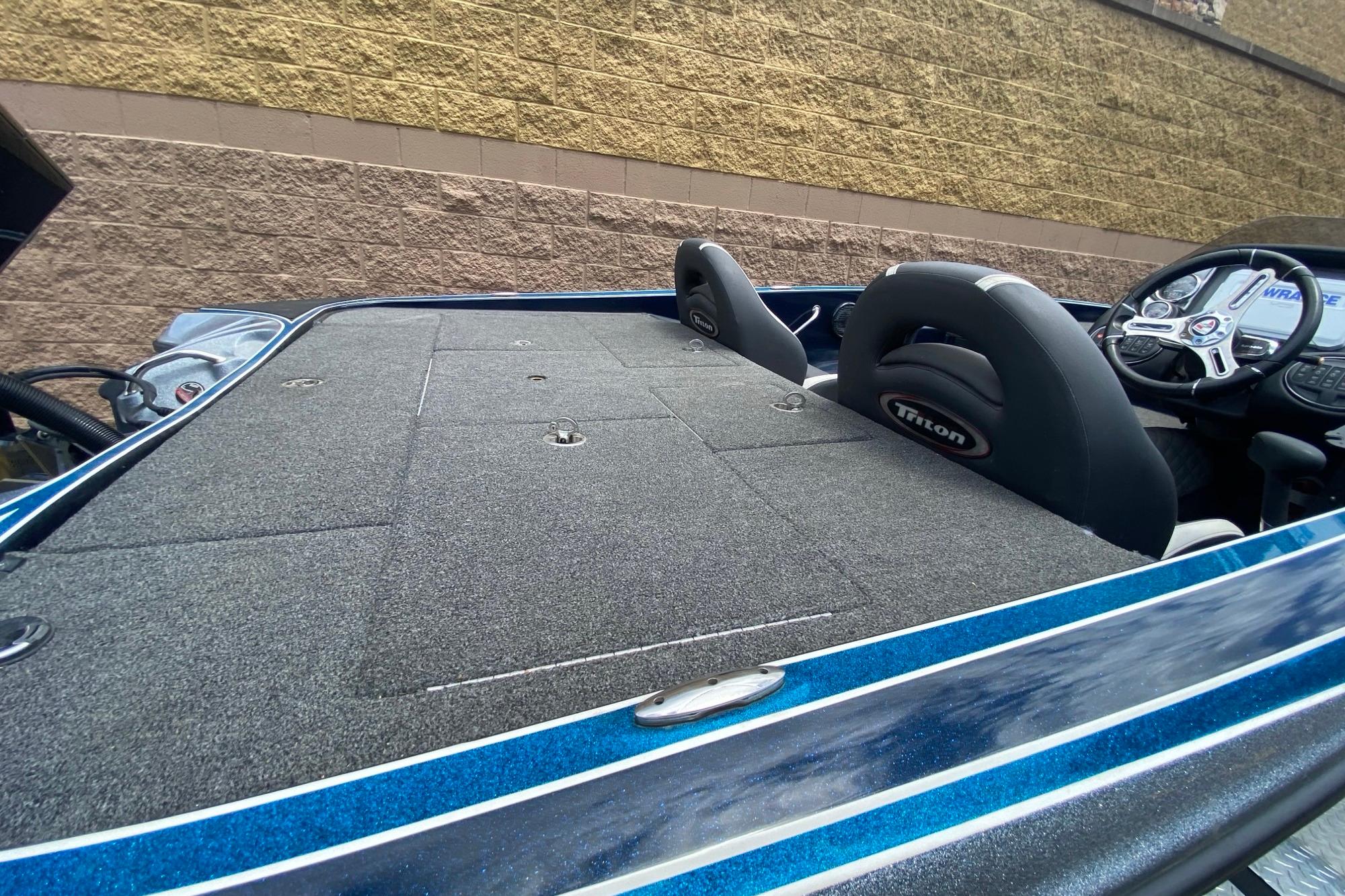 2020 Triton 20 TrX Patriot boat interior with seating and dashboard view.
