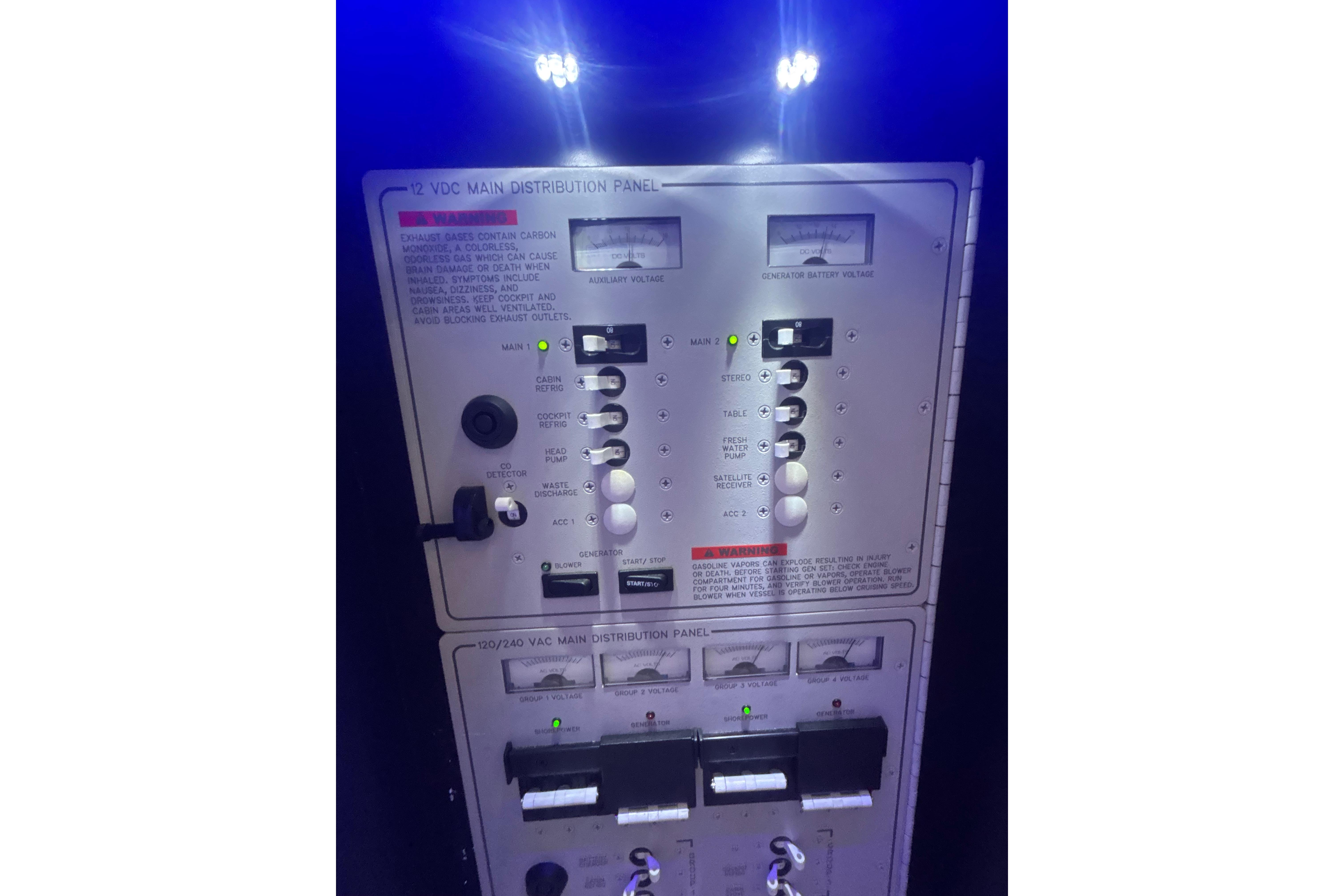 Control panel of a 2019 Formula 430 Super Sport Crossover boat, illuminated in blue light.