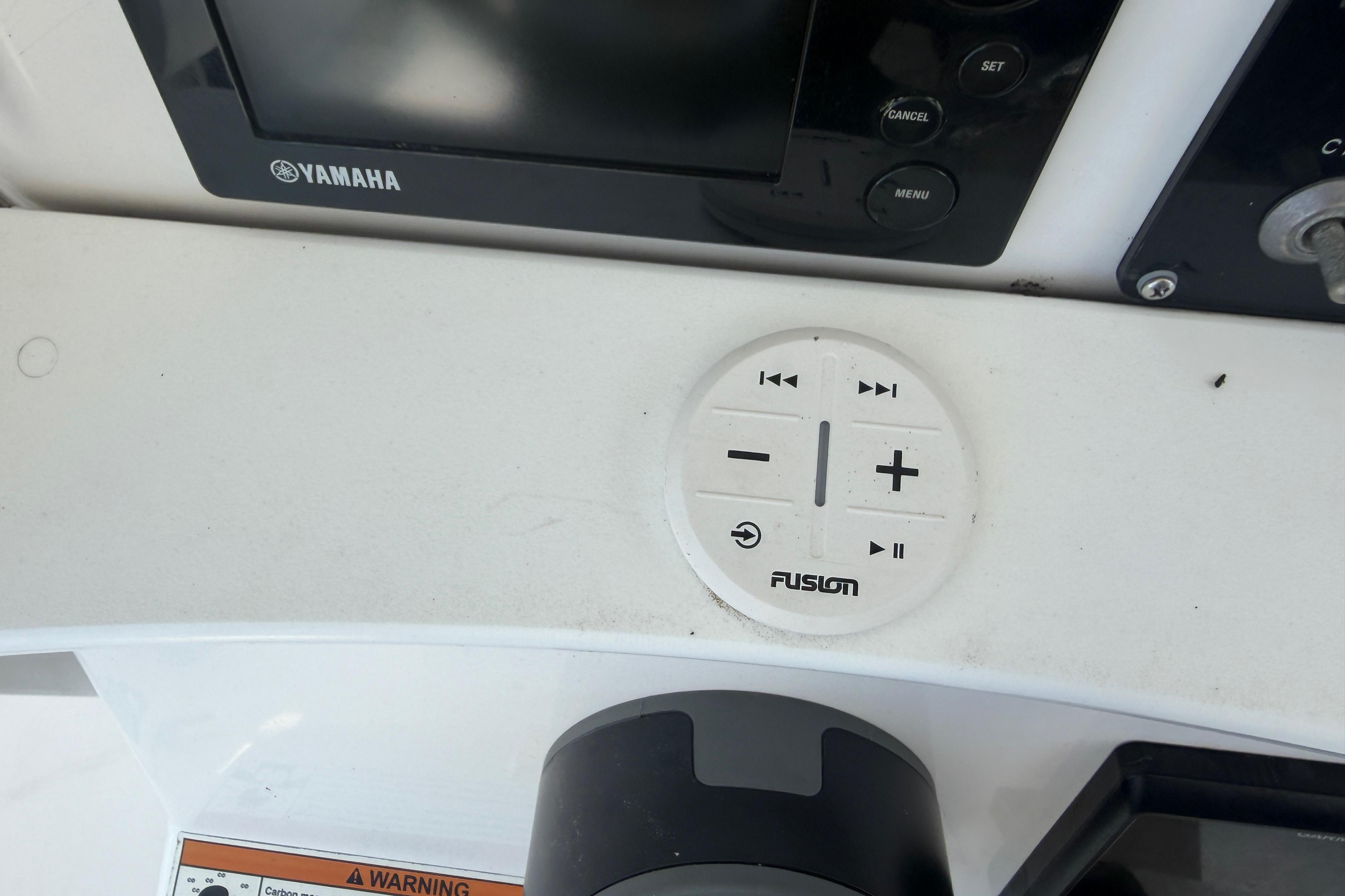 Control panel of a 2018 Everglades 355 Center Console boat with Yamaha and Fusion systems.