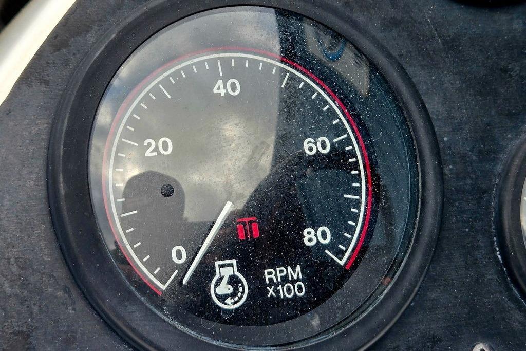 Tachometer of 1996 Champion 181 SX showing RPM with temperature icon.