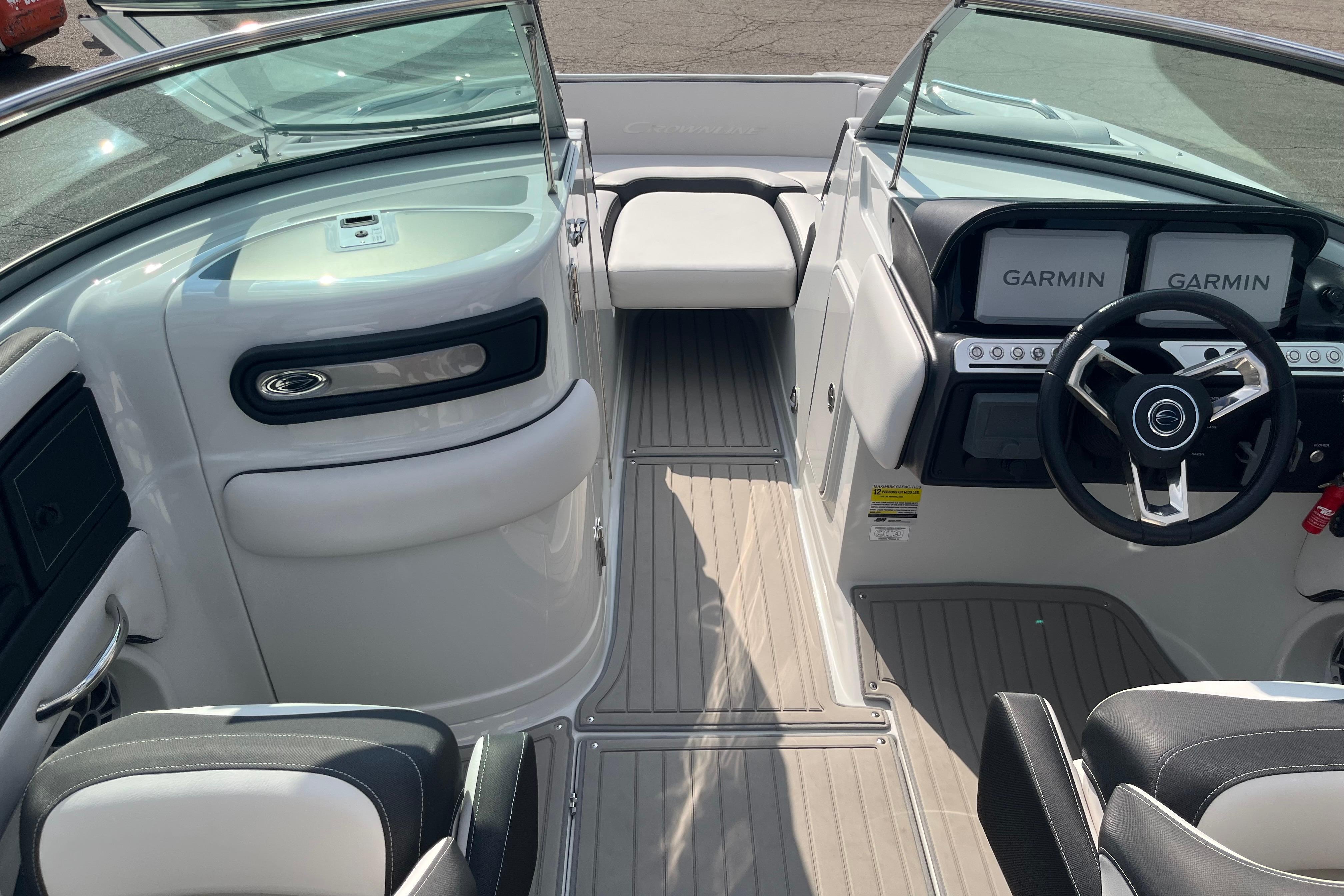 Interior view of 2025 Crownline Eclipse E235 boat with Garmin navigation system.