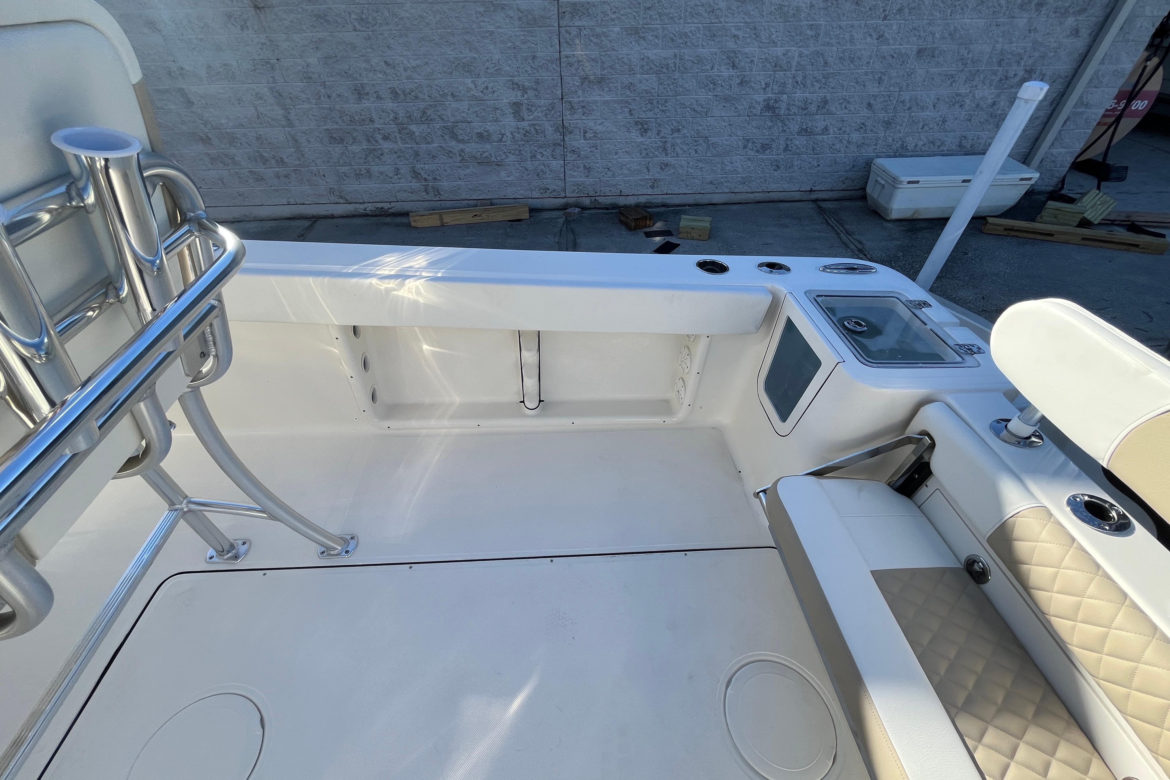 2026 Bulls Bay 255 Center Console boat interior with seating and rod holders.