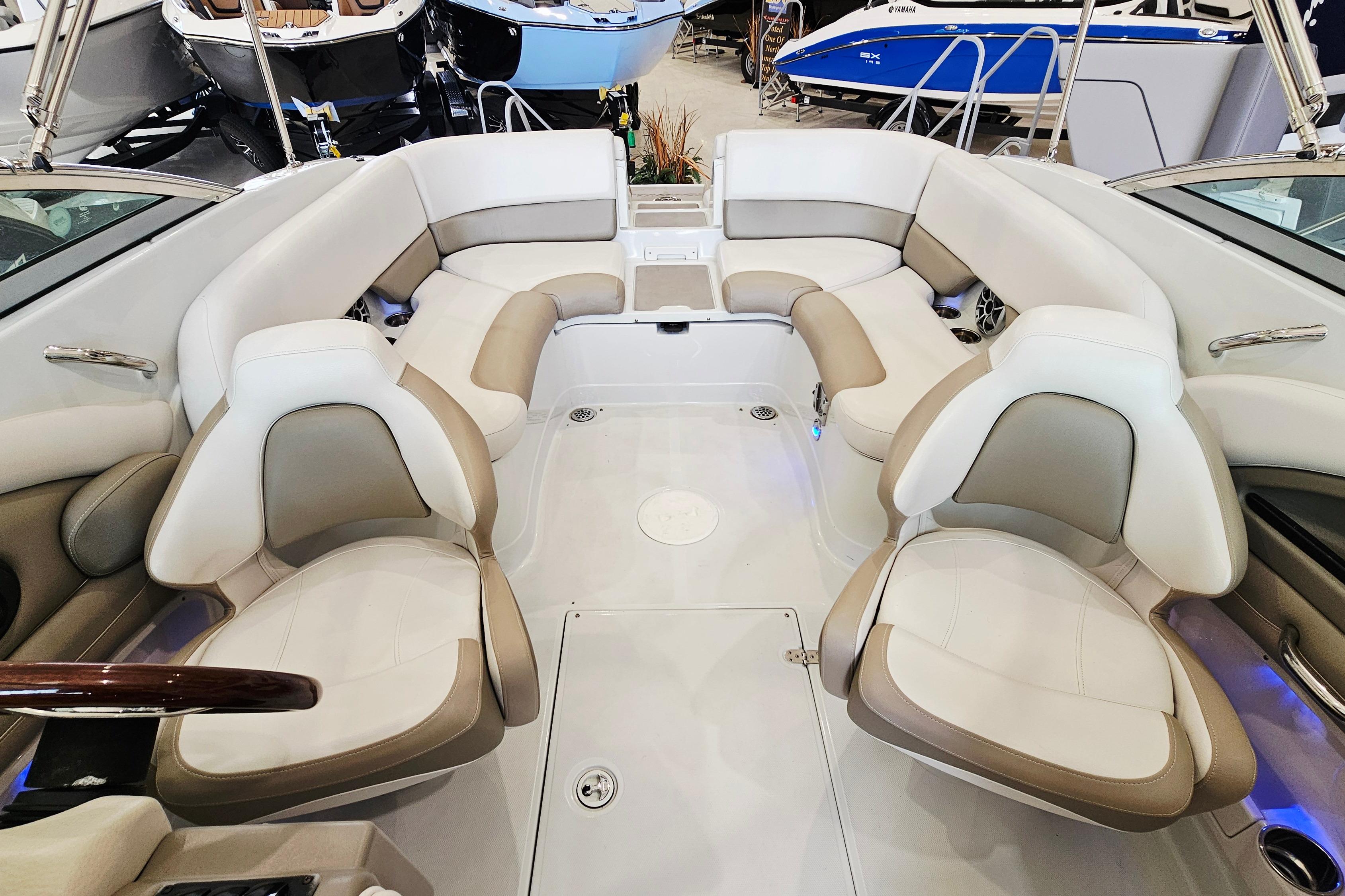 Interior view of 2014 Crownline 255 SS boat with spacious seating arrangement.