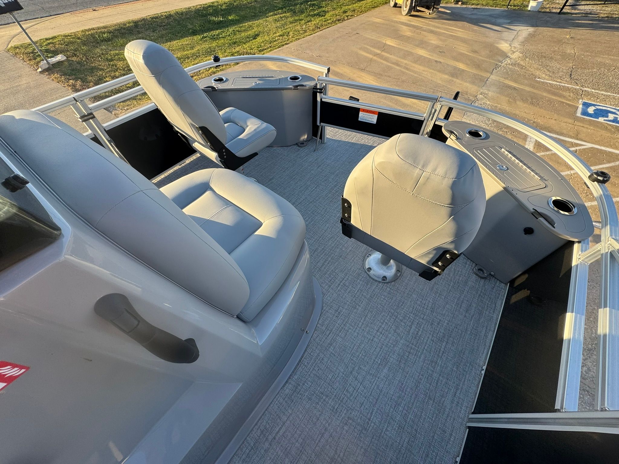 Interior of 2026 Landau Alure 21CC Fish with gray seating.