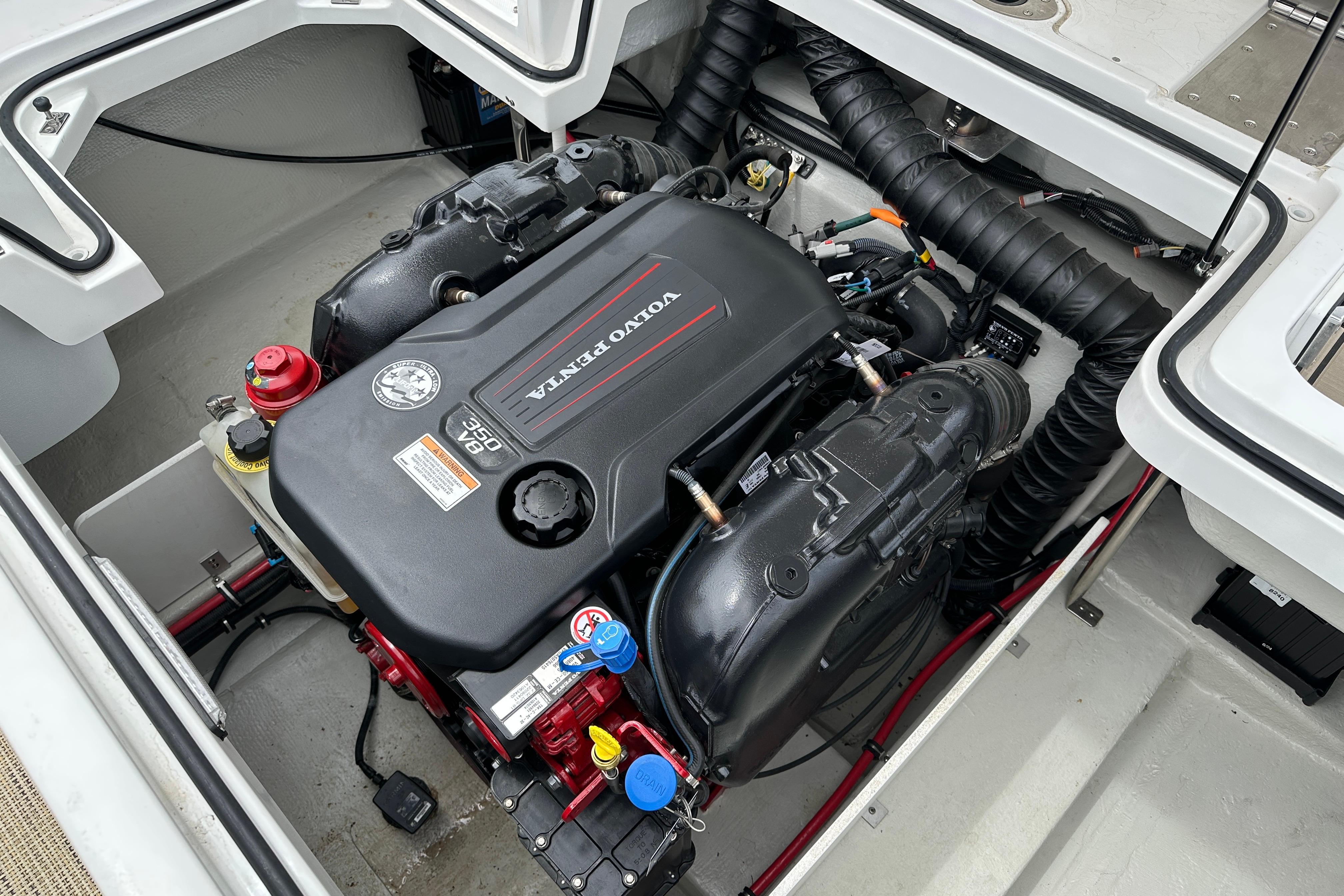 Engine compartment of a 2019 Cobalt R5 boat featuring a Volvo Penta engine.